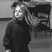 Léana participe au concours pour gagner de l'argent avec cette photo : child, girl, sweater, black_and_white, indoor, floor, chair, table, long_hair, motion, portrait, person, clothing, tile_floor, furniture, casual, young, cute, expression, monochrome