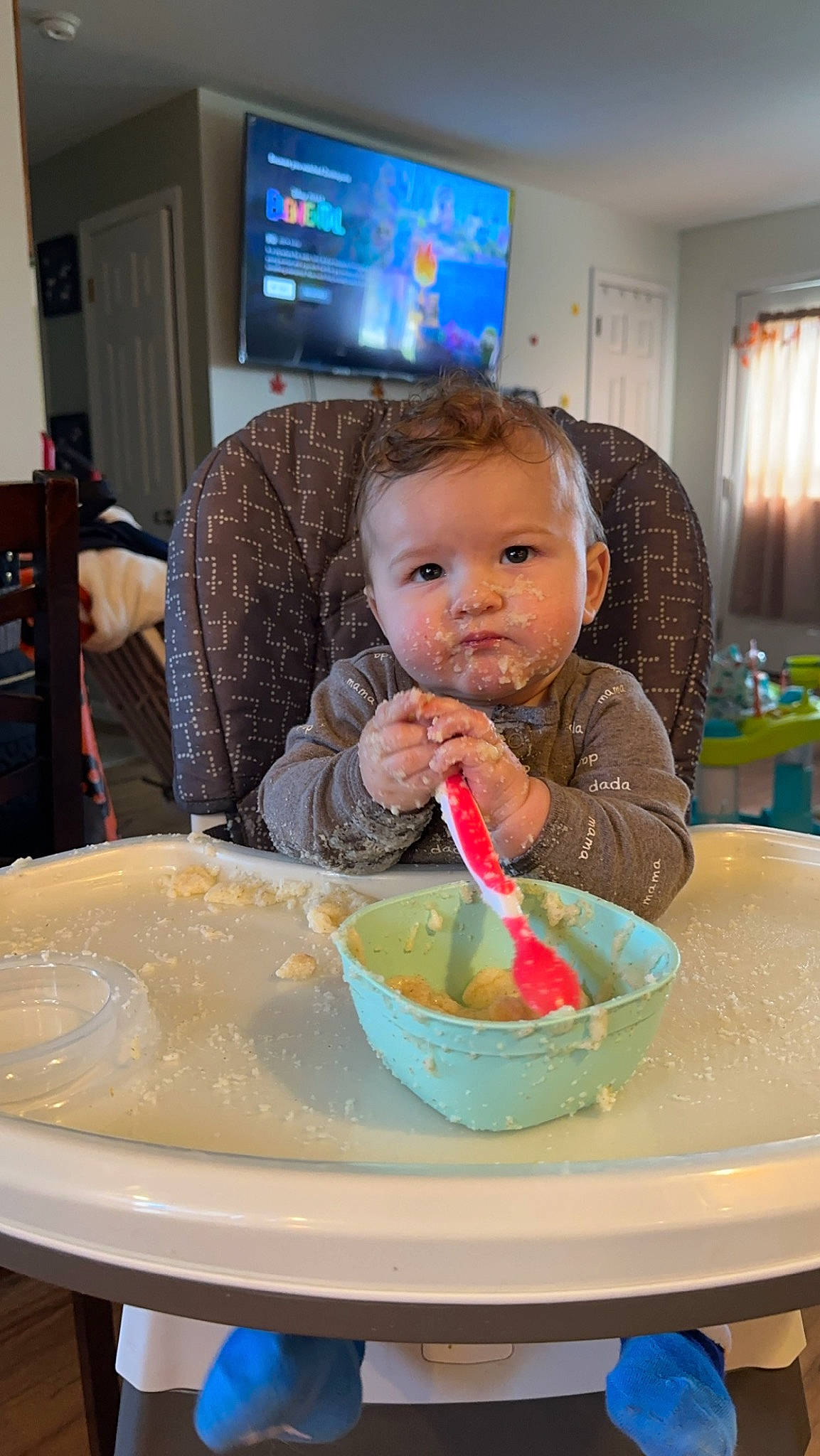 Jett joined the competition — help win amazing prizes! baby, blue, bowl, chair, comfort_food, cooking, cuisine, curtain, dish, food, food_craving, ingredient, kitchen_utensil, leisure, person, plate, spoon, table, tableware, television