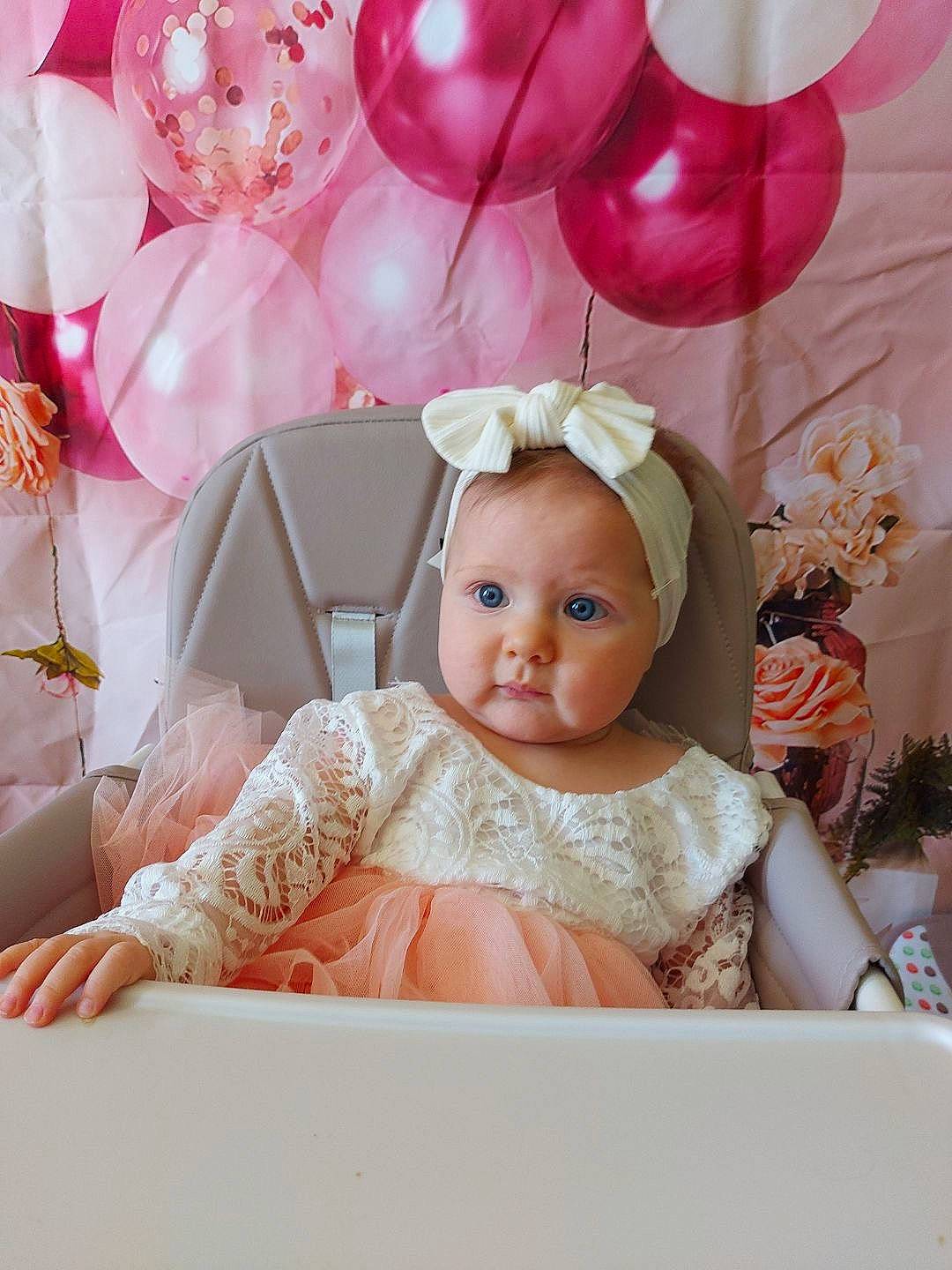 Sofia participe au concours pour gagner de l'argent avec cette photo : baby, baby_toddler_clothing, balloon, bridal_accessory, child, dress, embellishment, event, happy, headpiece, magenta, party_supply, peach, person, petal, picture_frame, pink, sweetness, textile, toddler