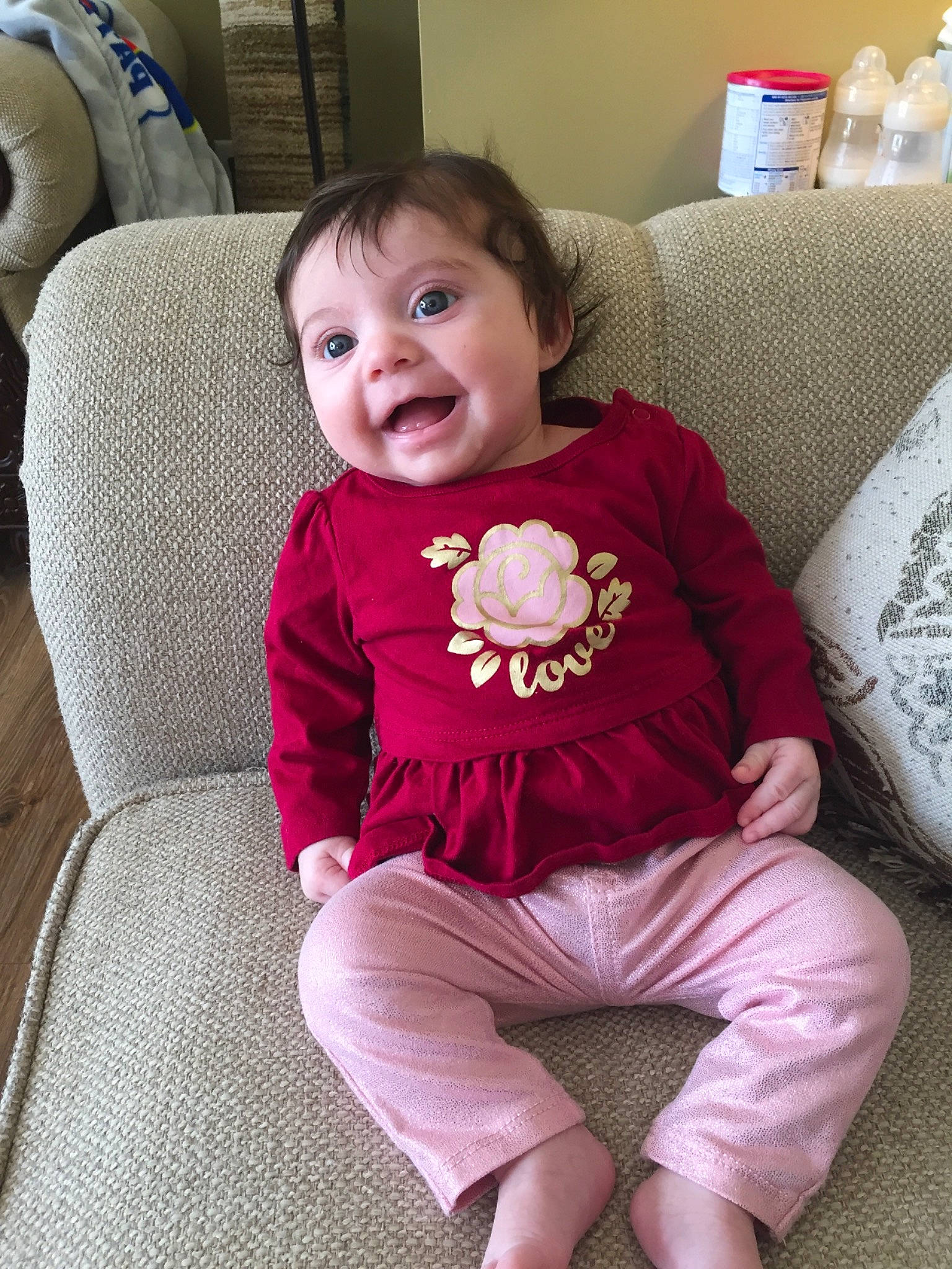 Clara Mae joined the competition — help win amazing prizes! baby, chair, cheek, child, face, furniture, head, person, pink, sitting, skin, smile, toddler