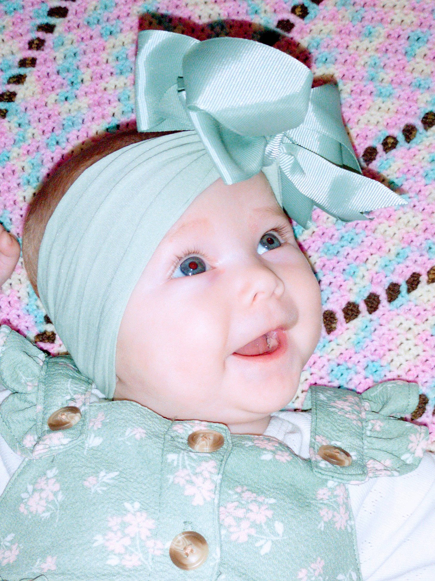 Emmajean is registered to the contest to win money with this photo: baby, baby_products, baby_toddler_clothing, cap, child, costume_hat, fashion_accessory, fictional_character, hair_accessory, happy, headgear, headpiece, headwear, linens, magenta, pattern, person, pink, sleeve, smile