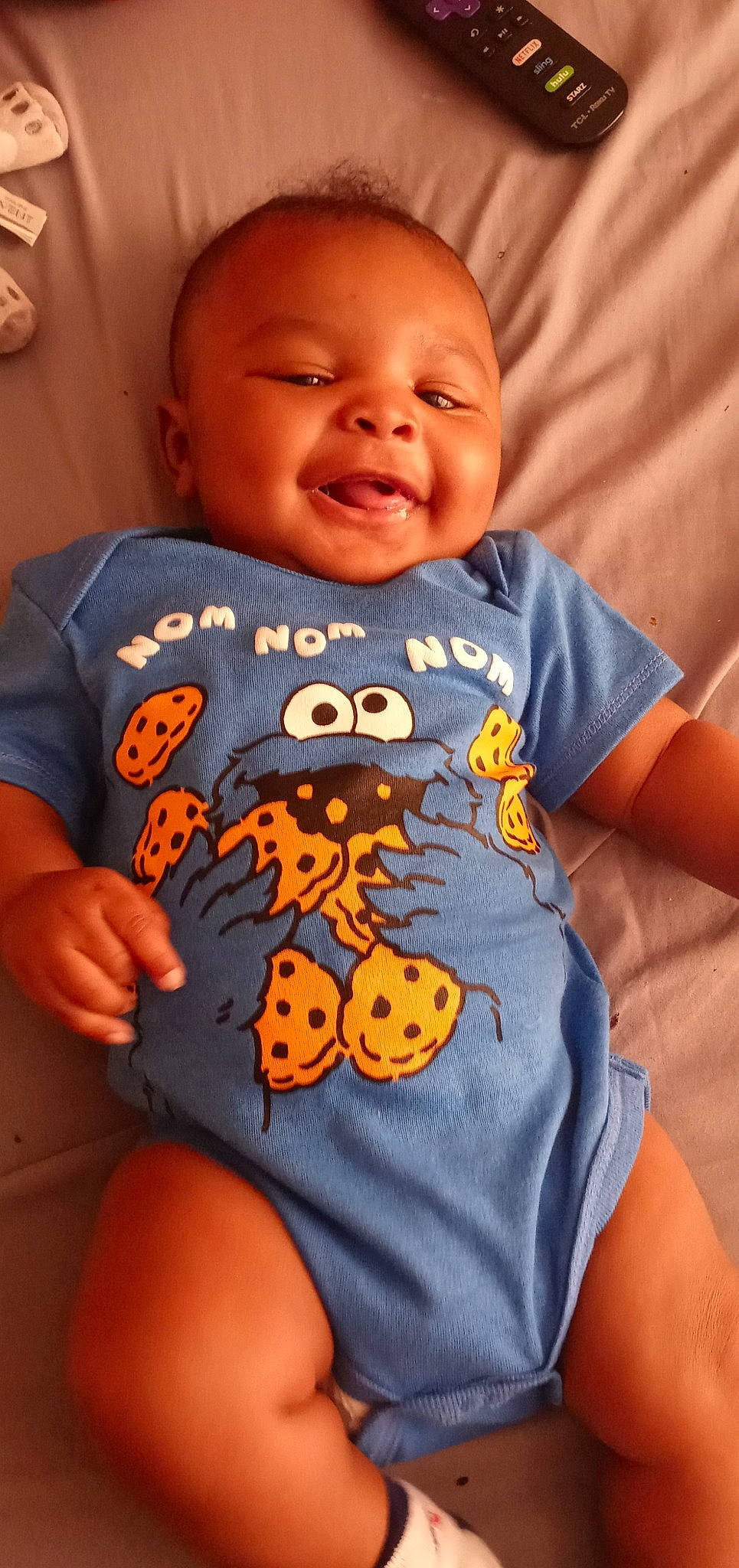 Javion Johnson joined the competition — help win amazing prizes! arm, baby_toddler_clothing, cheek, chin, eye, face, facial_expression, hairstyle, happy, head, mouth, neck, nose, orange, organ, person, skin, sleeve, smile, textile
