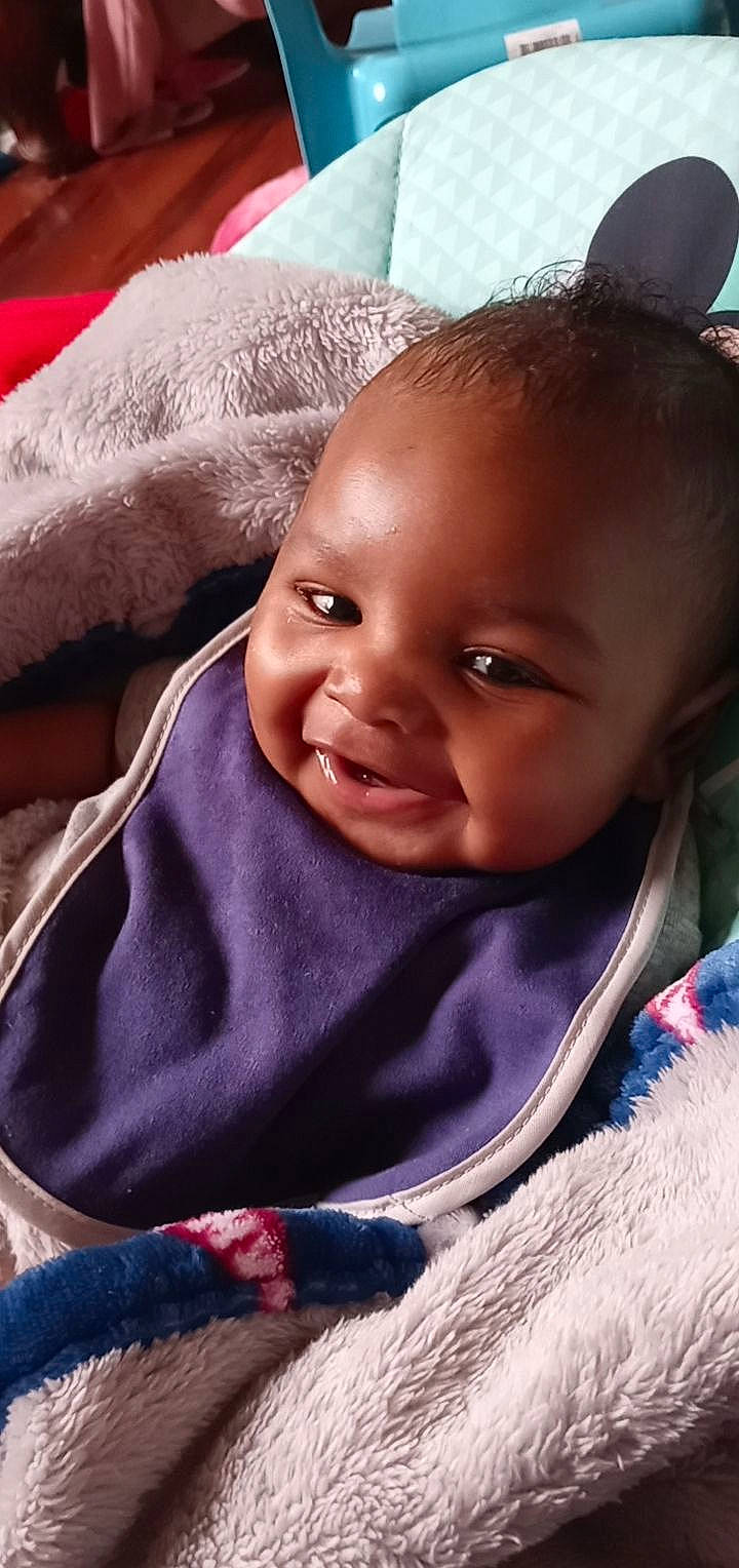 Javion Johnson is registered to the contest to win money with this photo: baby_toddler_clothing, cheek, chin, comfort, ear, eye, eyebrow, eyelash, forehead, happy, iris, lip, mouth, neck, nose, person, pink, product, purple, skin