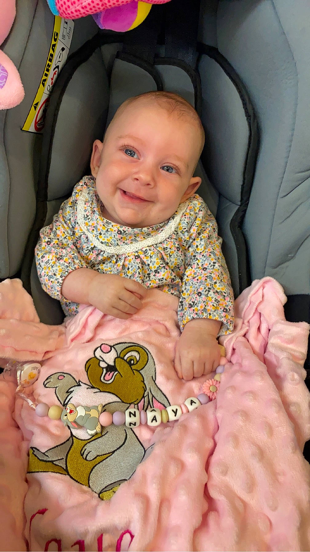 Naya participe au concours pour gagner de l'argent avec cette photo : baby, baby_safety, baby_toddler_clothing, cheek, child, chin, comfort, eye, finger, fun, gesture, head, joy, linens, mouth, nail, person, skin, smile, thumb