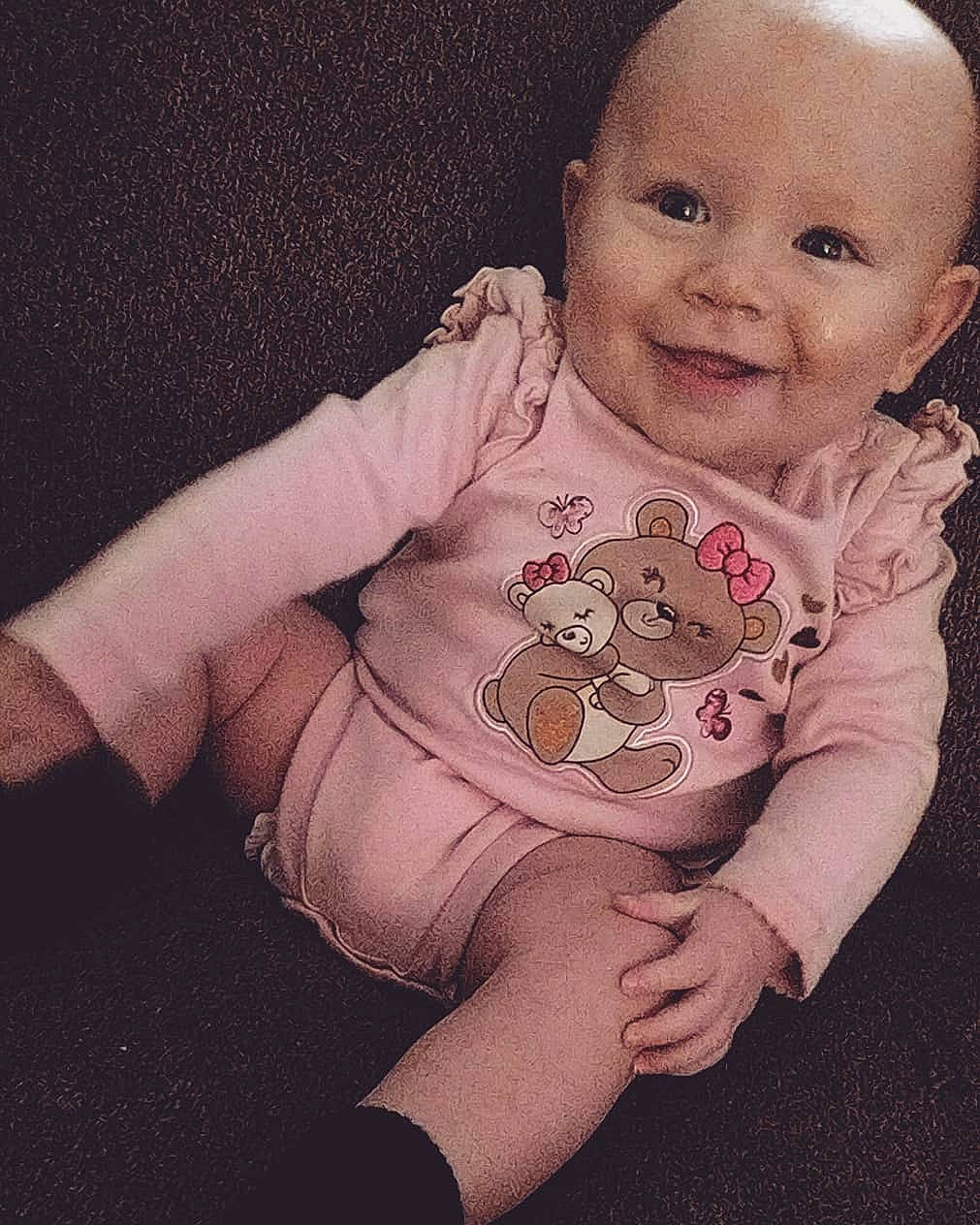 Bryleigh joined the competition — help win amazing prizes! arm, baby, baby_making_funny_faces, baby_toddler_clothing, cheek, child, finger, hand, head, joy, lip, person, pink, skin, sleeve, smile, toddler