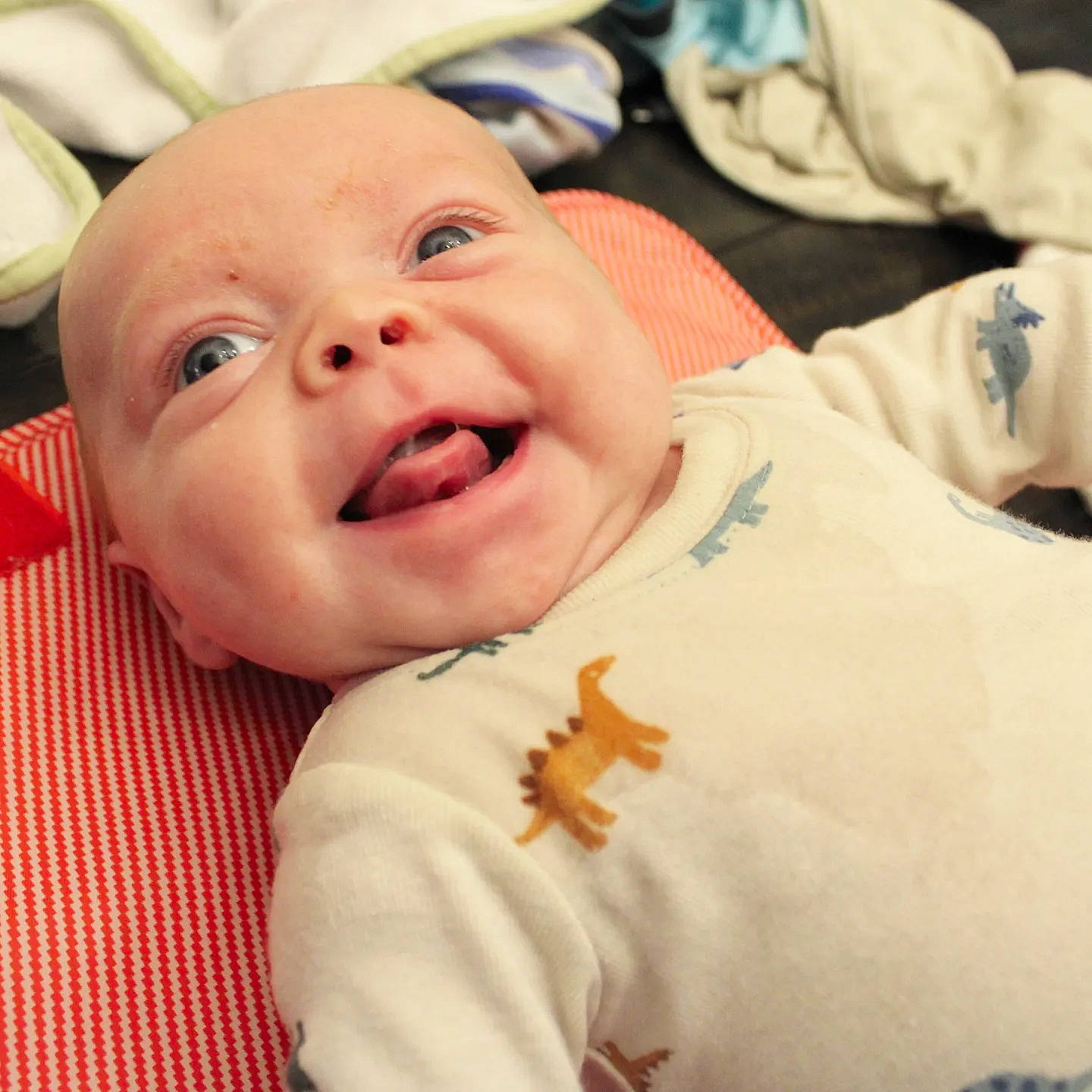 Dayvian is registered to the contest to win money with this photo: baby, baby_laughing, baby_making_funny_faces, baby_toddler_clothing, cheek, chin, comfort, event, eyebrow, fun, gesture, happy, linens, lip, mouth, nose, person, skin, sleeve, smile