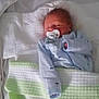newborn, baby, pacifier, blanket, pajamas, crib, pillow, sleeping, infant, hospital, bed, child, resting, clothing, soft, cute, indoors, person, toddler, peaceful