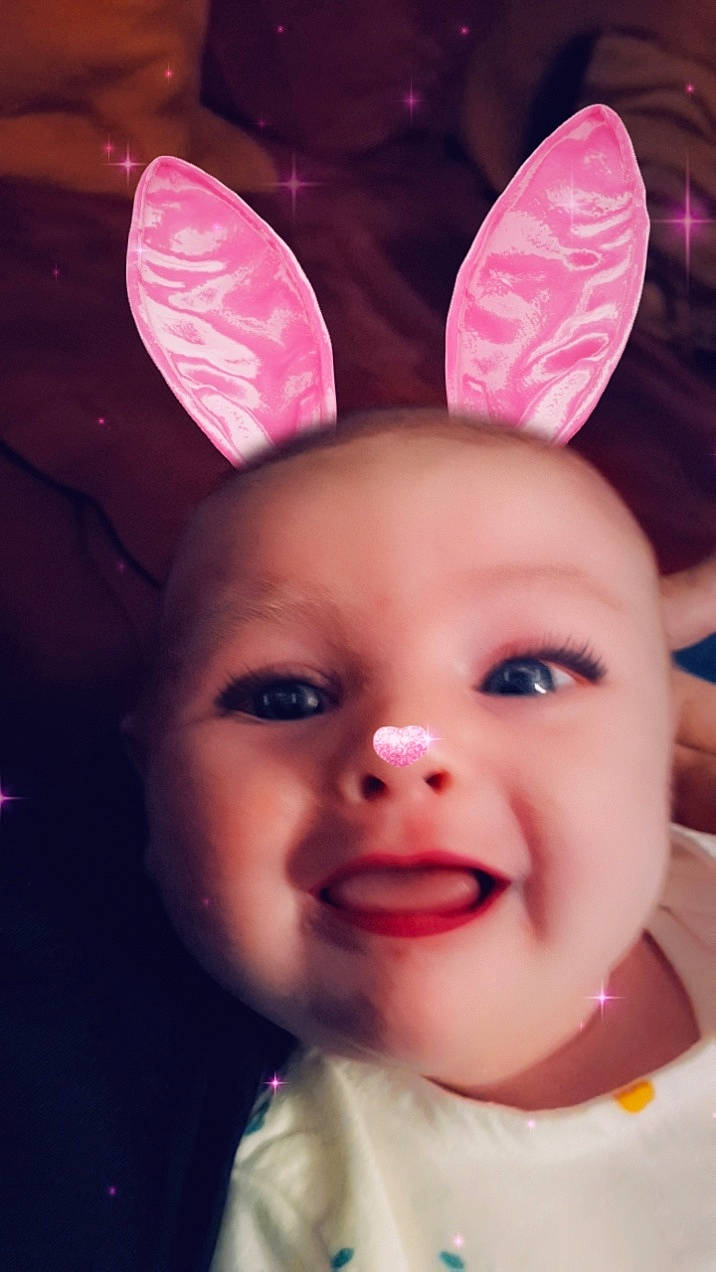 Lucie a rejoint le concours — aidez-le/la à gagner de superbes lots ! cheek, chin, ear, eye, eyebrow, face, gesture, happy, head, headgear, human_body, lip, mouth, nose, person, photograph, pink, skin, smile, toddler