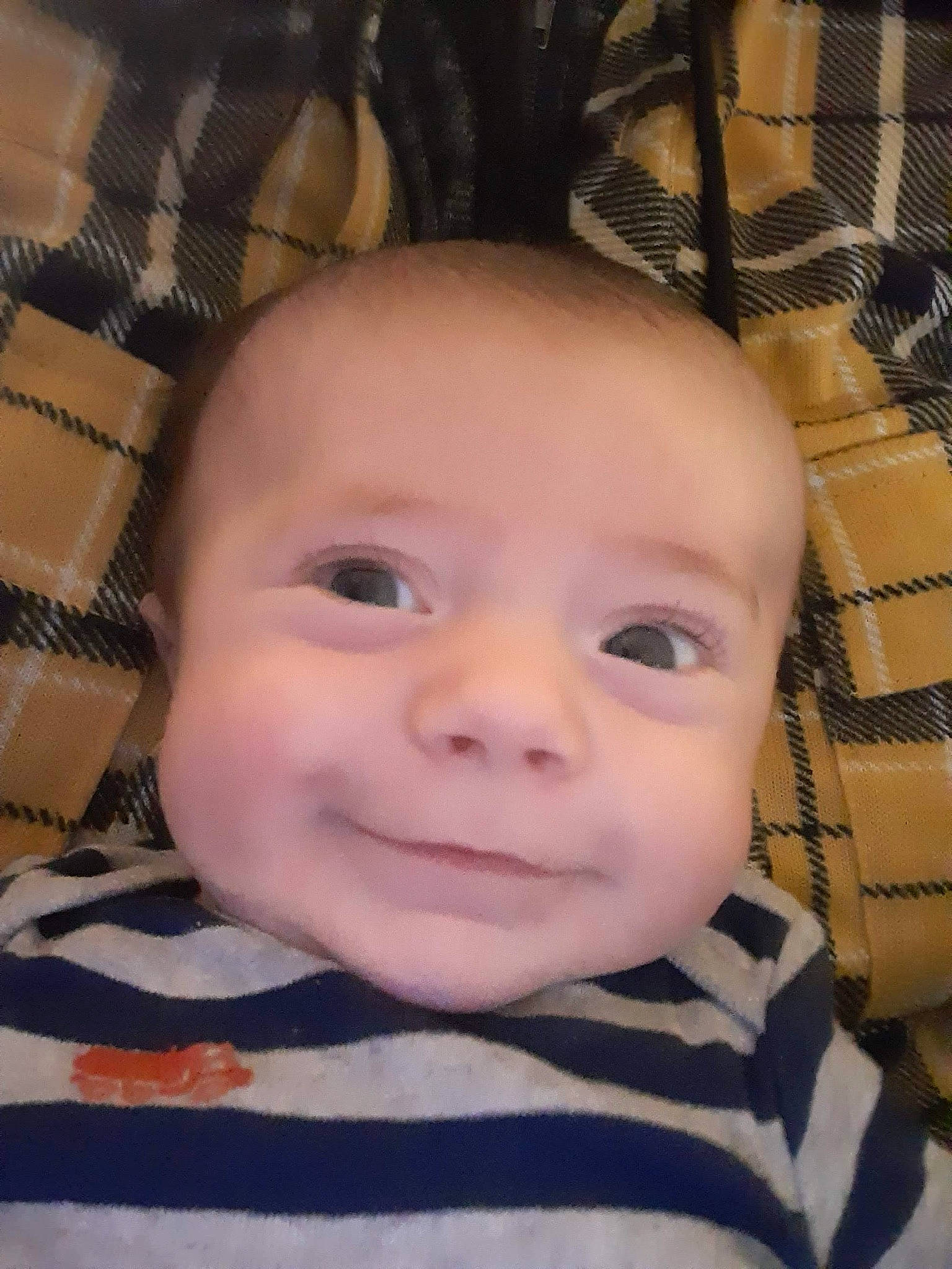 Drake is registered to the contest to win money with this photo: baby, baby_toddler_clothing, cheek, child, chin, comfort, eye, eyebrow, eyelash, face, happy, head, iris, lip, nose, pattern, person, sitting, skin, smile