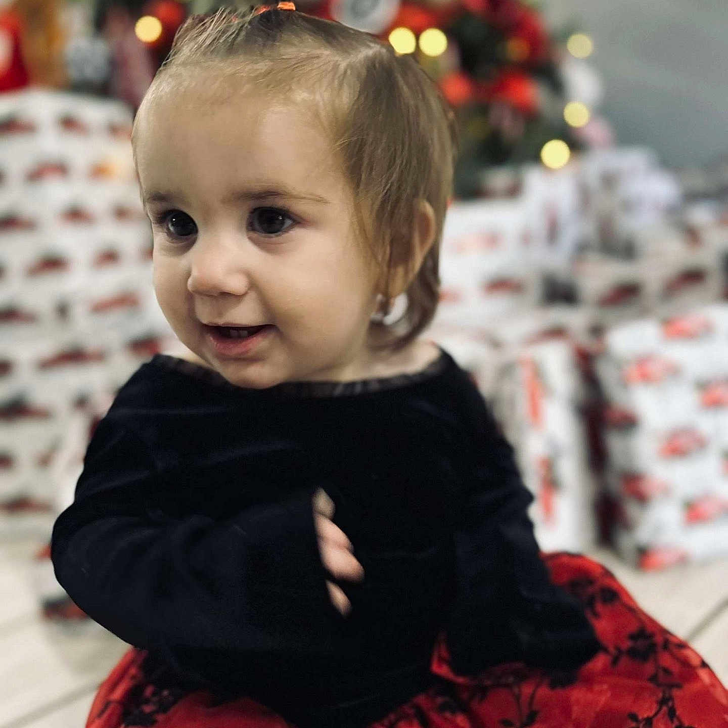 Koralyn is registered to the contest to win money with this photo: baby, babylaughing, brownhair, clothing, face, festival, hair, happy, head, openingpresent, person, photography, portrait, sitting, sleeve, smile