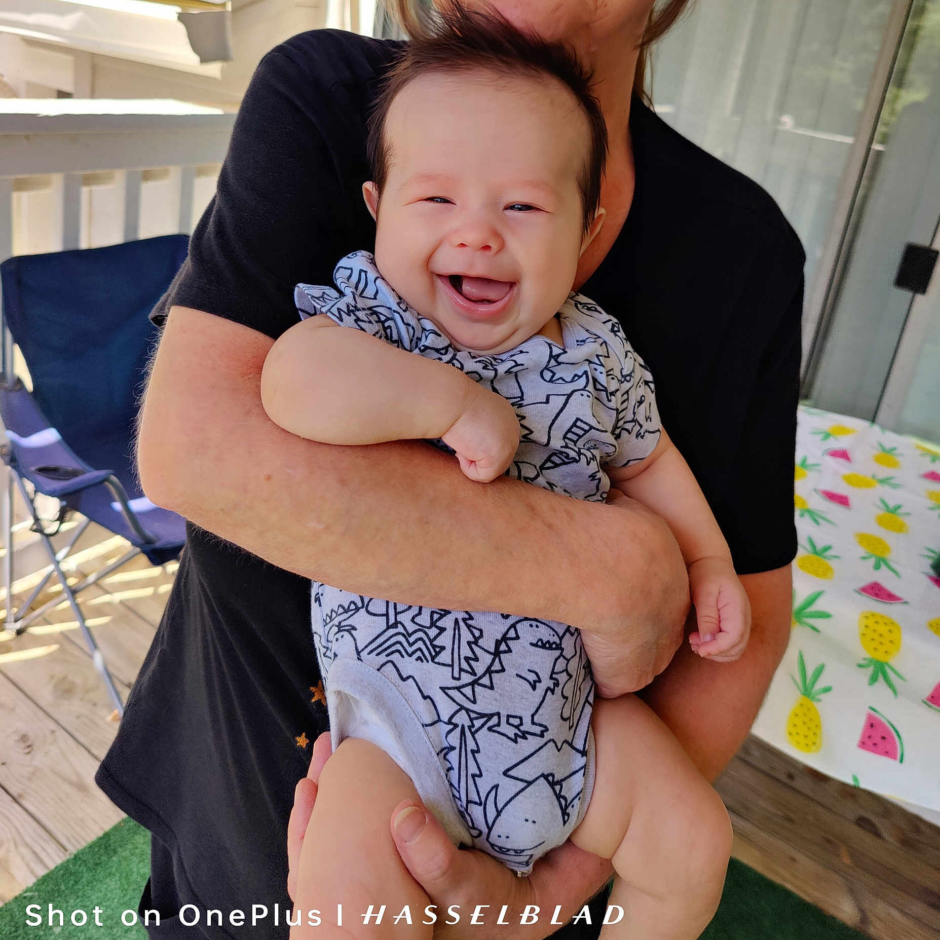 Hayes is registered to the contest to win money with this photo: baby, bodypart, chair, clothing, cushion, diaper, face, finger, furniture, hand, head, homedecor, newborn, people, person, photography, portrait, shorts, t_shirt, wood