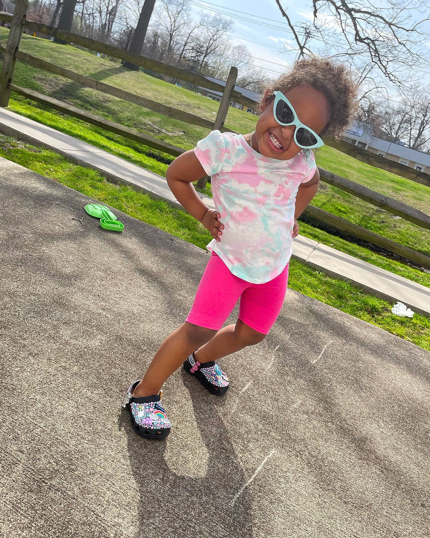 Nala joined the competition — help win amazing prizes! asphalt, electric_blue, eyewear, fence, fun, grass, happy, joy, leg, leisure, magenta, person, pink, plant, recreation, shorts, sidewalk, sky, sneakers, sunglasses