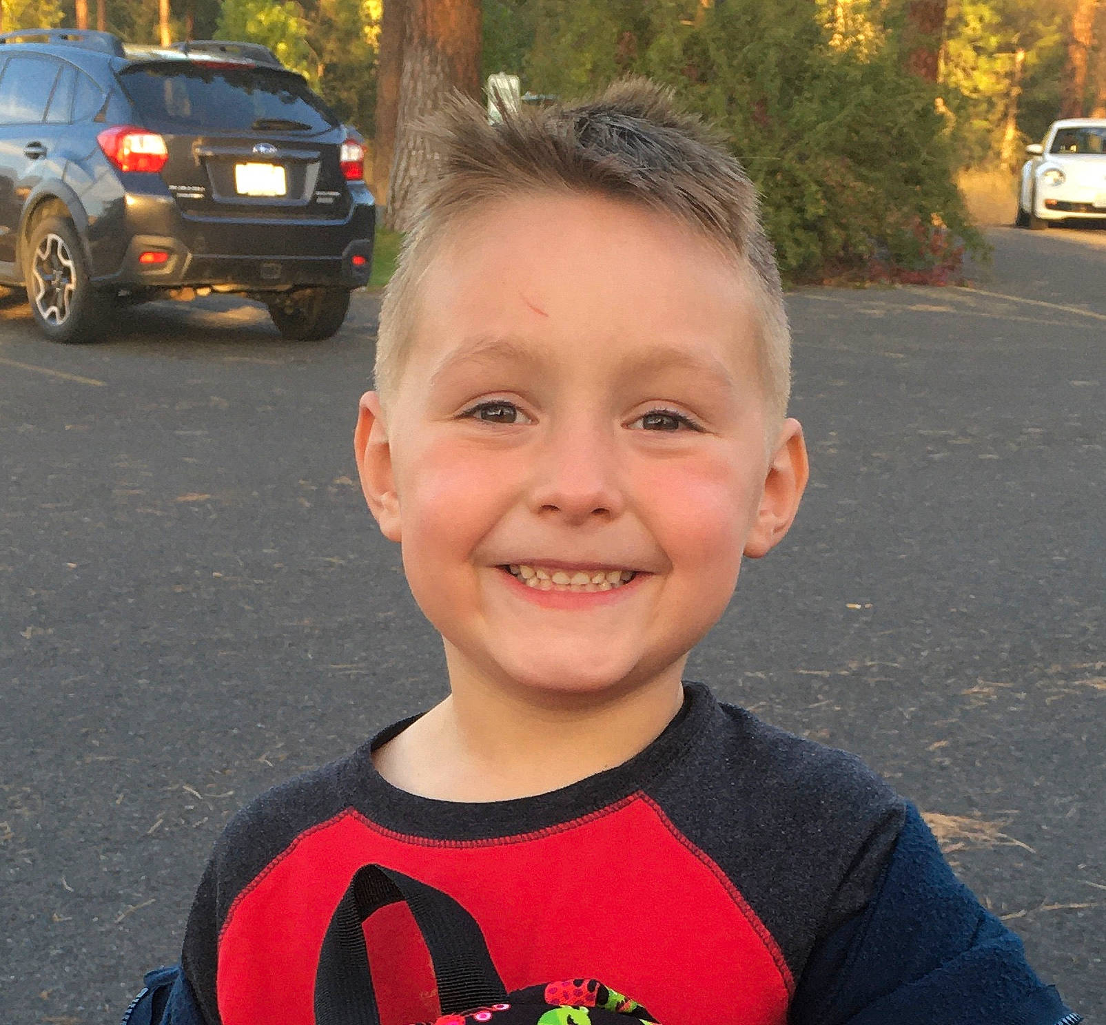Brayden joined the competition — help win amazing prizes! alloy_wheel, asphalt, automotive_lighting, automotive_tail_brake_light, baby_toddler_clothing, carmine, child, cool, crossover_suv, ear, eye, family_car, full_size_car, happy, joy, luxury_vehicle, person, sport_utility_vehicle, t_shirt, toddler
