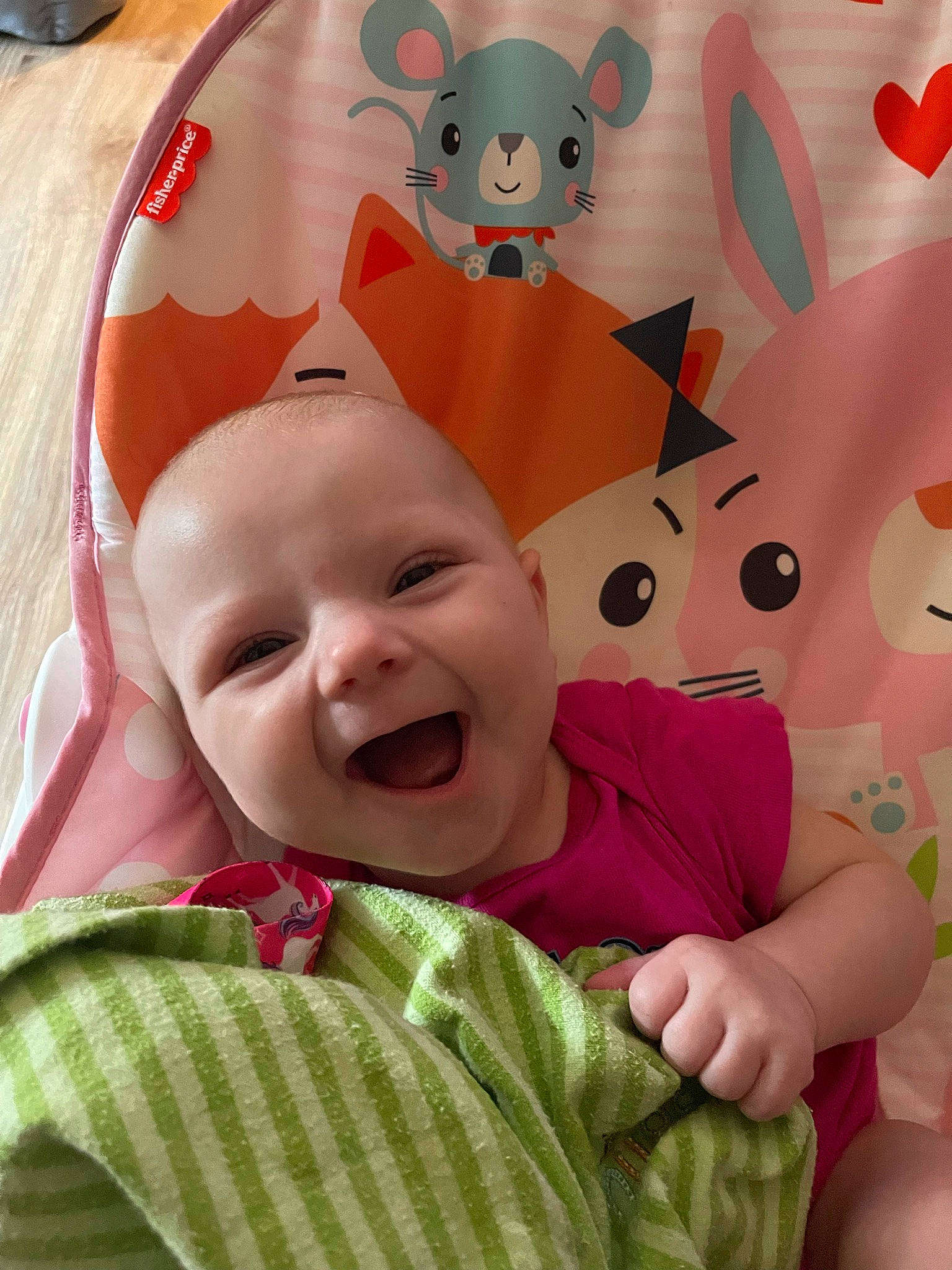 Haylee is registered to the contest to win money with this photo: baby, baby_toddler_clothing, cheek, child, comfort, fun, gesture, green, happy, linens, organ, person, pink, product, red, skin, smile, stuffed_toy, textile, toddler