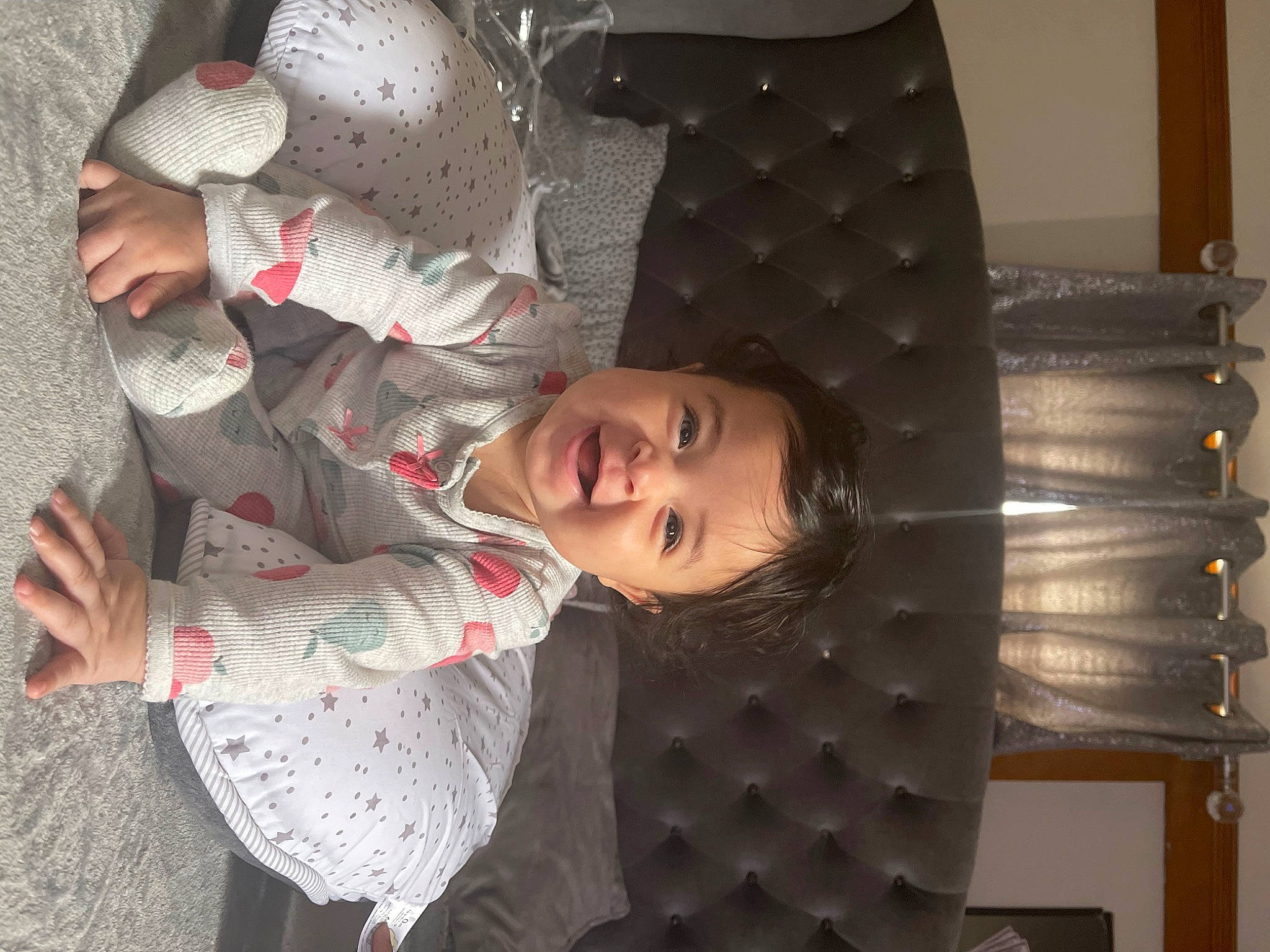 Dream is registered to the contest to win money with this photo: baby, carmine, child, concrete, fun, pattern, person, room, sitting, toddler