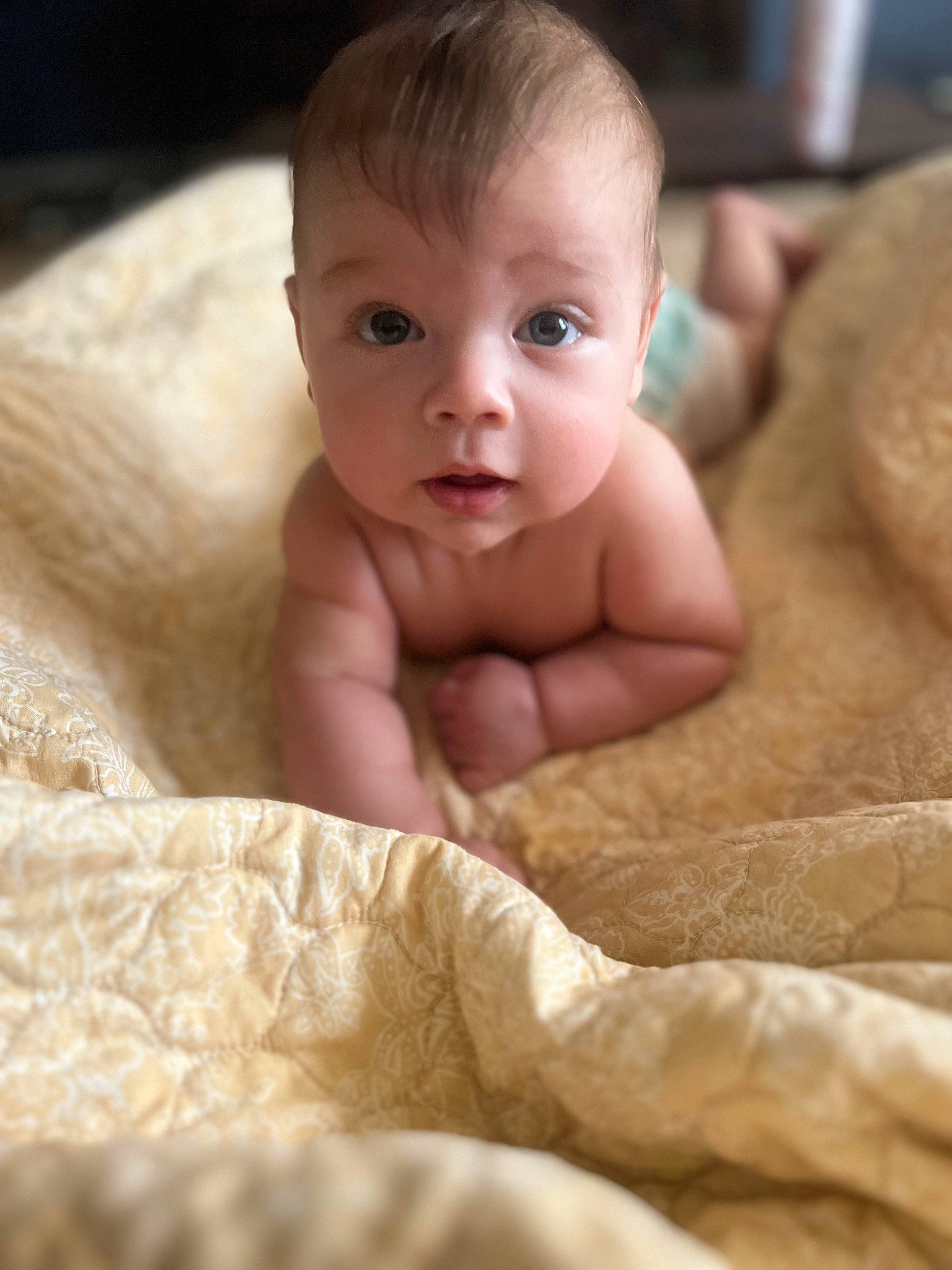 Sebastian is registered to the contest to win money with this photo: abdomen, arm, baby, cheek, chest, child, comfort, eyebrow, eyelash, finger, flooring, fur, gesture, linens, nail, neck, nose, person, thumb, toddler