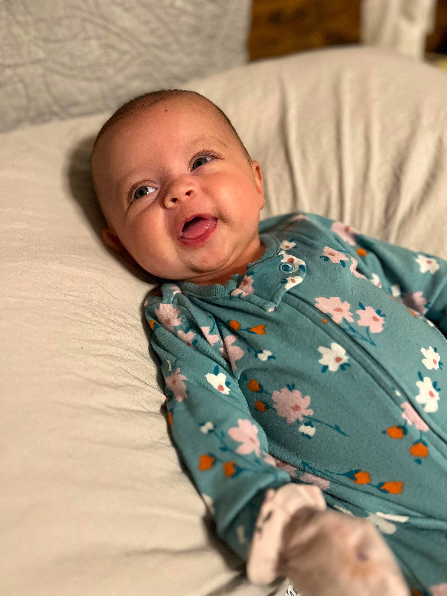 Emmie joined the competition — help win amazing prizes! baby, baby_toddler_clothing, bedding, bedtime, cheek, child, collar, comfort, eye, happy, head, linens, nose, person, room, sitting, skin, sleeve, smile, textile