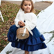 Kaylena joined the competition — help win amazing prizes! child, girl, portrait, outdoor, smiling, dress, white_coat, blue_dress, silver_boots, wicker_basket, headband, pearl_accessories, fashion, formalwear, standing, garden, grass, fallen_leaves, white_fabric, full_body