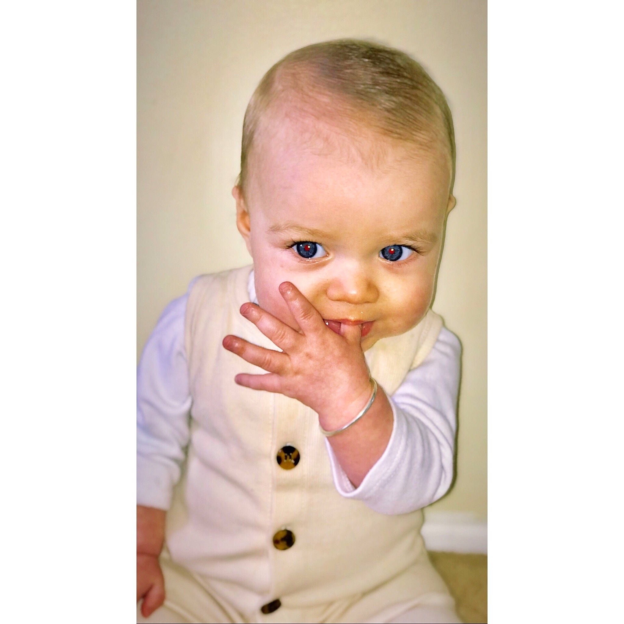 Nixon is registered to the contest to win money with this photo: baby, beige, blond, cheek, child, chin, ear, eye, face, finger, forehead, gesture, head, joy, lip, mouth, nose, person, portrait, skin