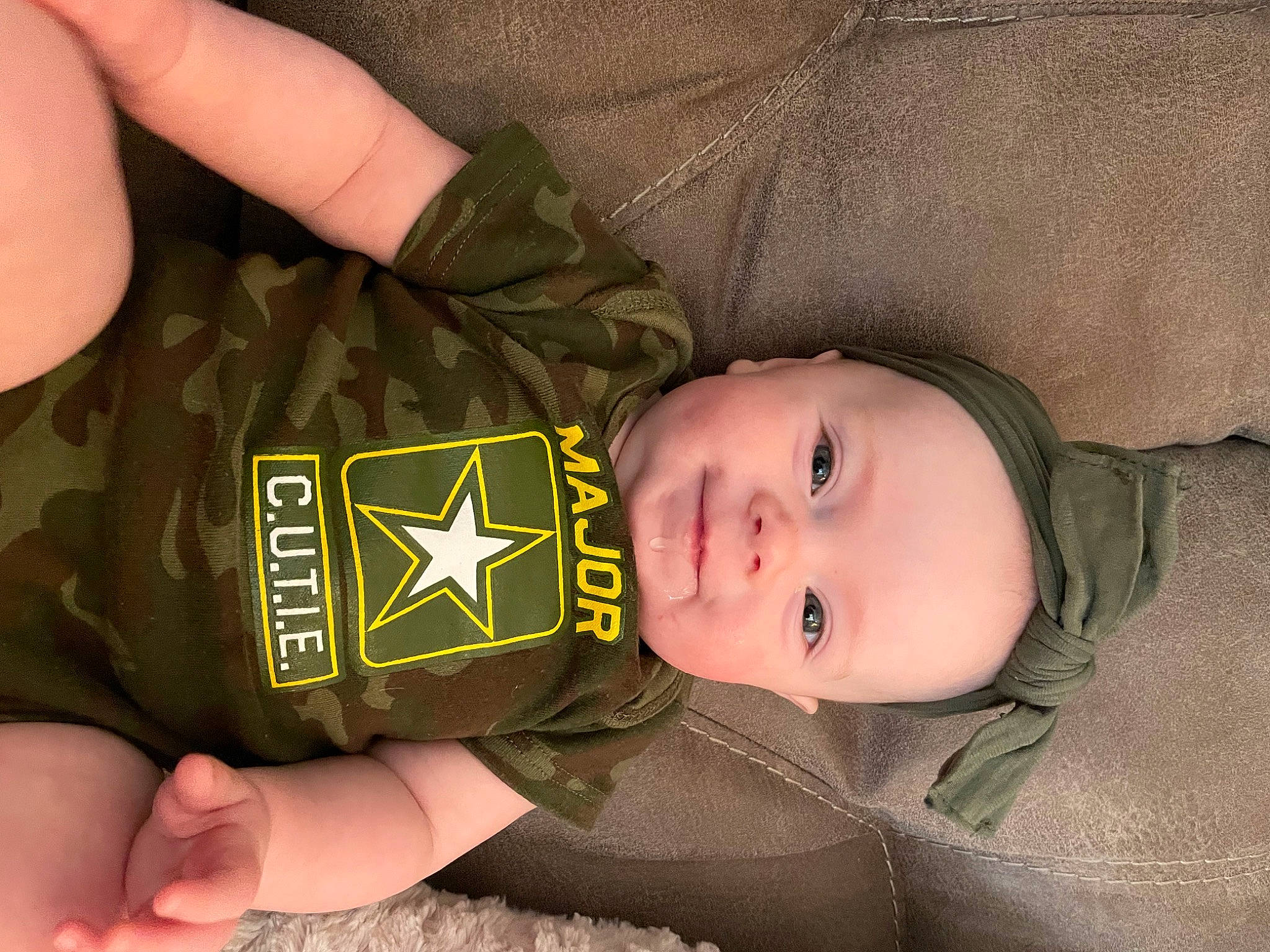 Eleanor joined the competition — help win amazing prizes! baby_toddler_clothing, child, comfort, drink, elbow, eye, face, finger, hand, logo, nail, pattern, person, personal_protective_equipment, sleeve, smile, thumb, toddler, wrist