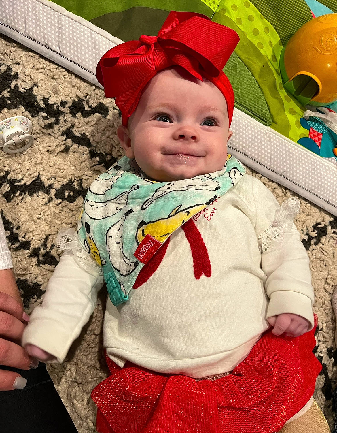 Eleanor is registered to the contest to win money with this photo: baby, baby_toddler_clothing, cap, child, costume_hat, event, eye, face, fictional_character, fun, grass, happy, hat, headgear, people_in_nature, person, pink, red, sleeve, smile