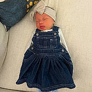 Scotti joined the competition — help win amazing prizes! baby, sleeping, denim_dress, headband, bow, couch, pillow, infant, peaceful, indoors, child, cute, resting, clothing, fabric, home, soft, portrait, toddler, cozy