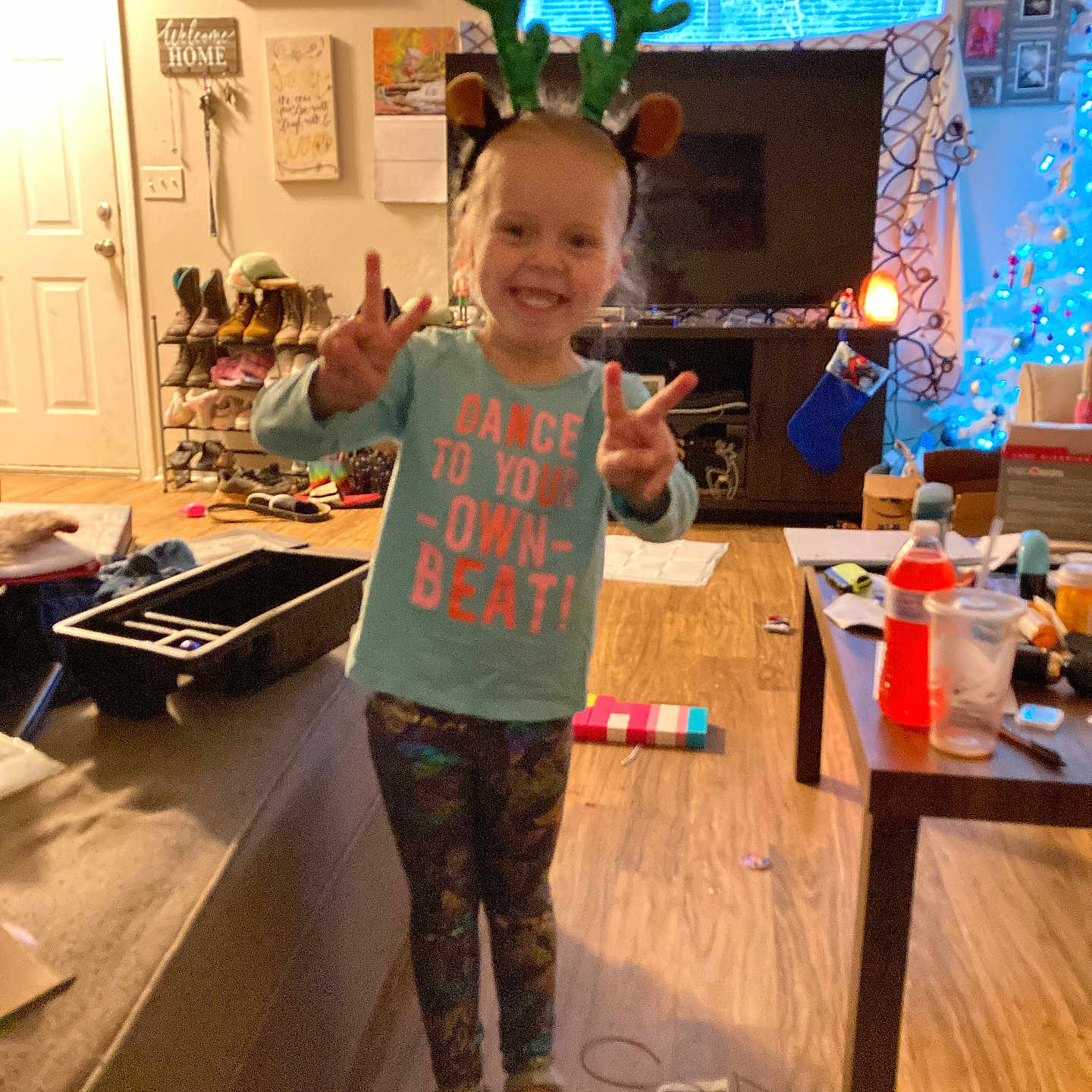 Harmony is registered to the contest to win money with this photo: architecture, boy, building, child, clothing, diningroom, diningtable, face, furniture, head, indoors, livingroom, male, person, photography, portrait, room, t_shirt, table, wood