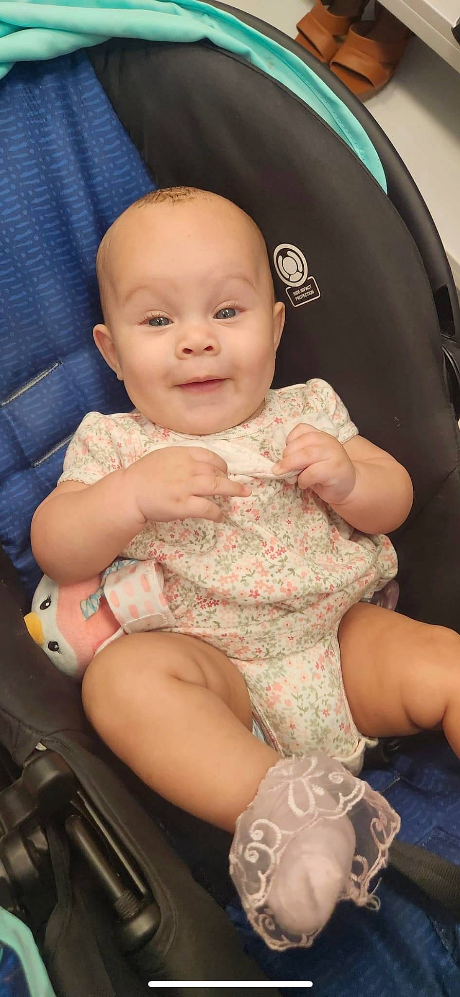 Cataleya is registered to the contest to win money with this photo: abdomen, baby, baby_toddler_clothing, chair, cheek, chest, child, comfort, happy, human_leg, iris, joy, lap, mouth, person, skin, smile, stomach, thigh, thumb