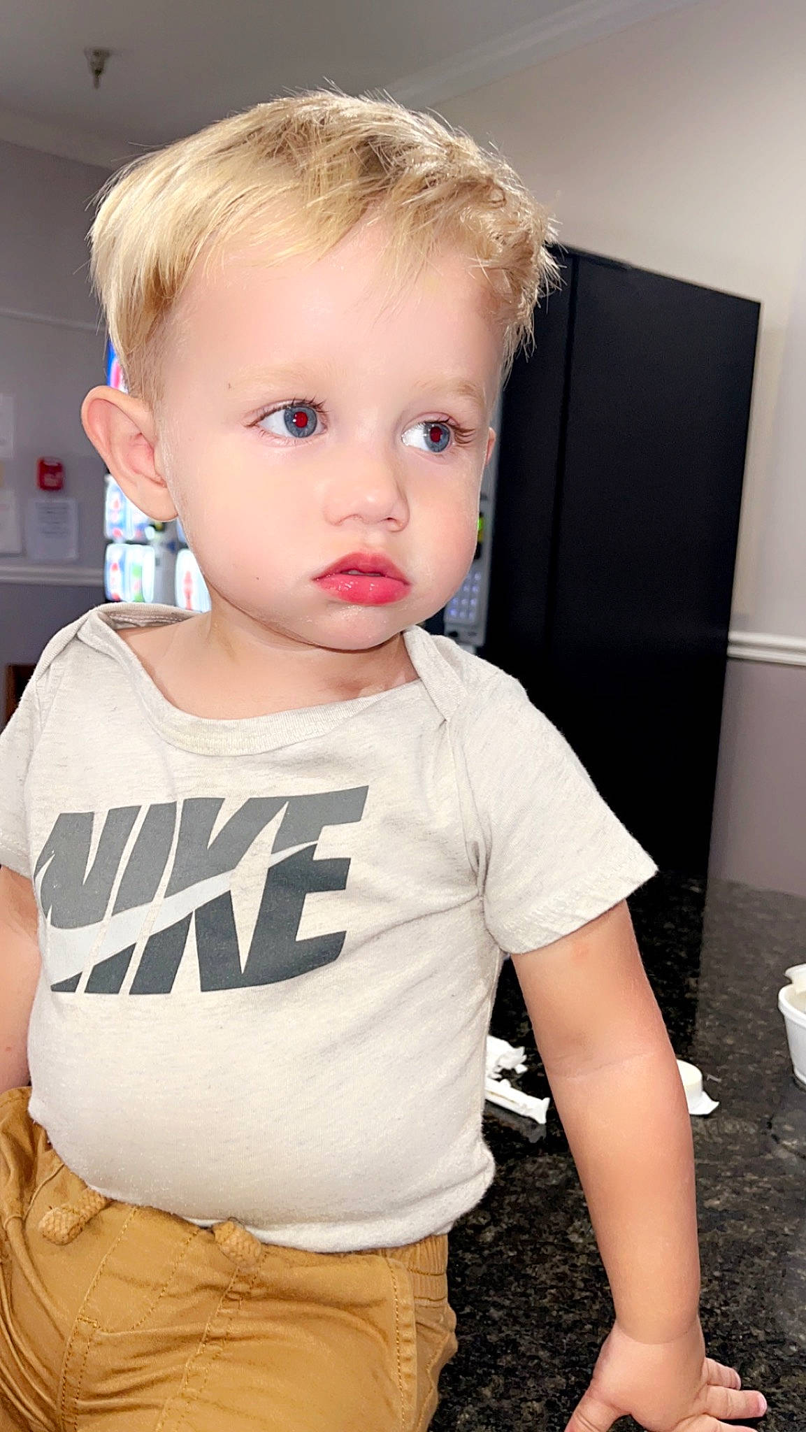 Ryder is registered to the contest to win money with this photo: baby_toddler_clothing, blond, cheek, child, cool, eyebrow, eyelash, flooring, fun, hair, hairstyle, happy, head, iris, neck, person, shoulder, skin, sleeve, t_shirt