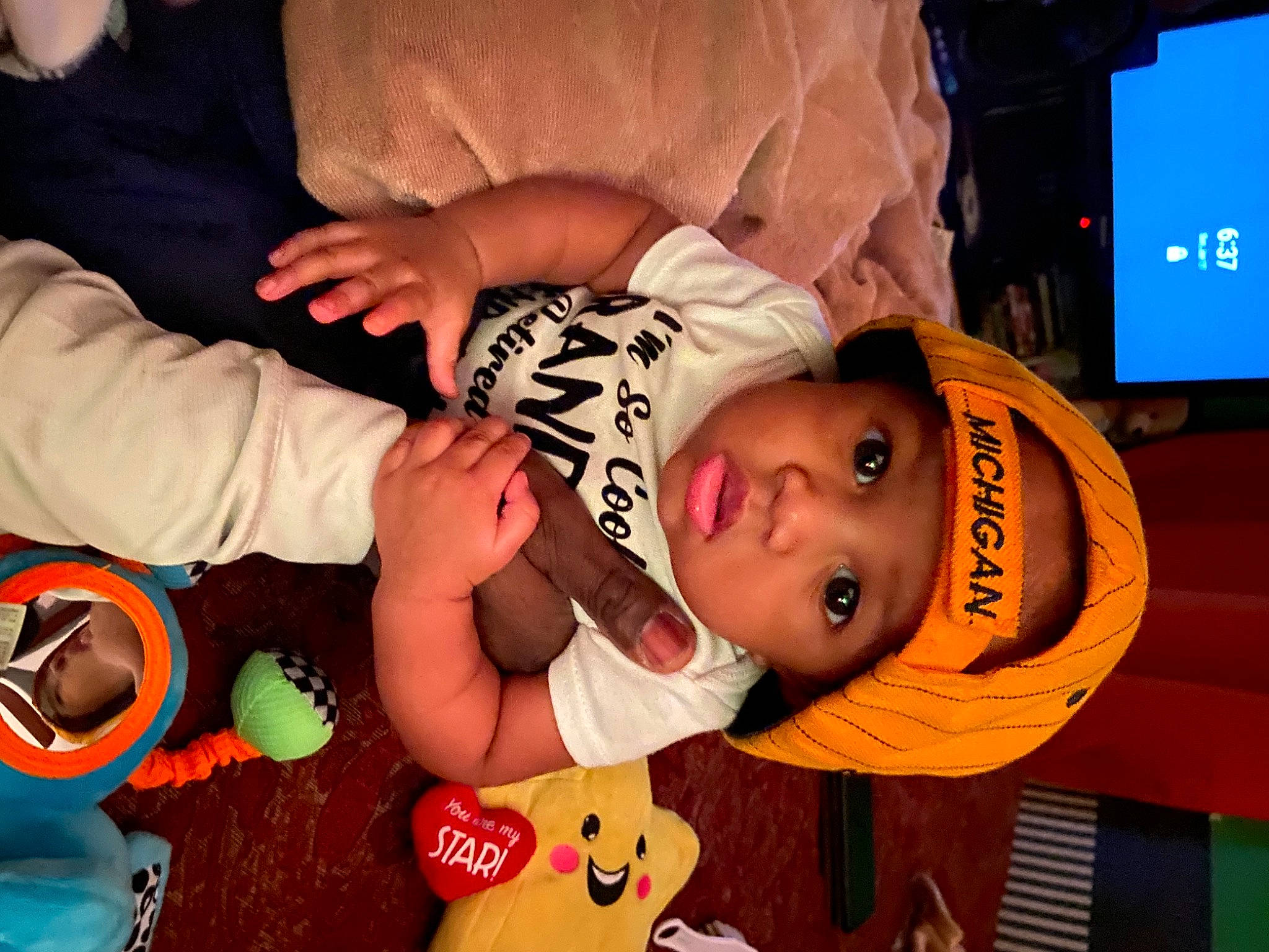 Zyire joined the competition — help win amazing prizes! baby, baby_toddler_clothing, child, computer_keyboard, event, facial_expression, fun, games, happy, hat, headwear, icing, mouth, orange, person, play, recreation, room, sweetness, toddler