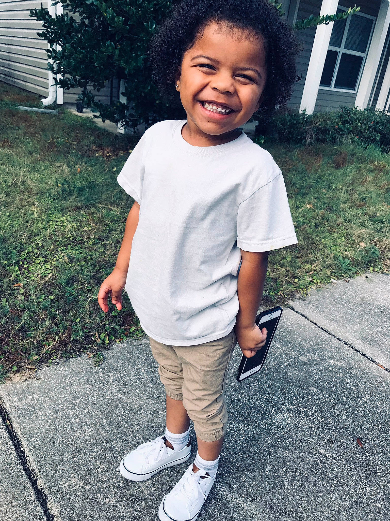 Ahmir joined the competition — help win amazing prizes! asphalt, child, cool, fun, grass, hairstyle, happy, joy, knee, person, plant, recreation, shorts, sleeve, smile, sneakers, sportswear, standing, t_shirt, toddler