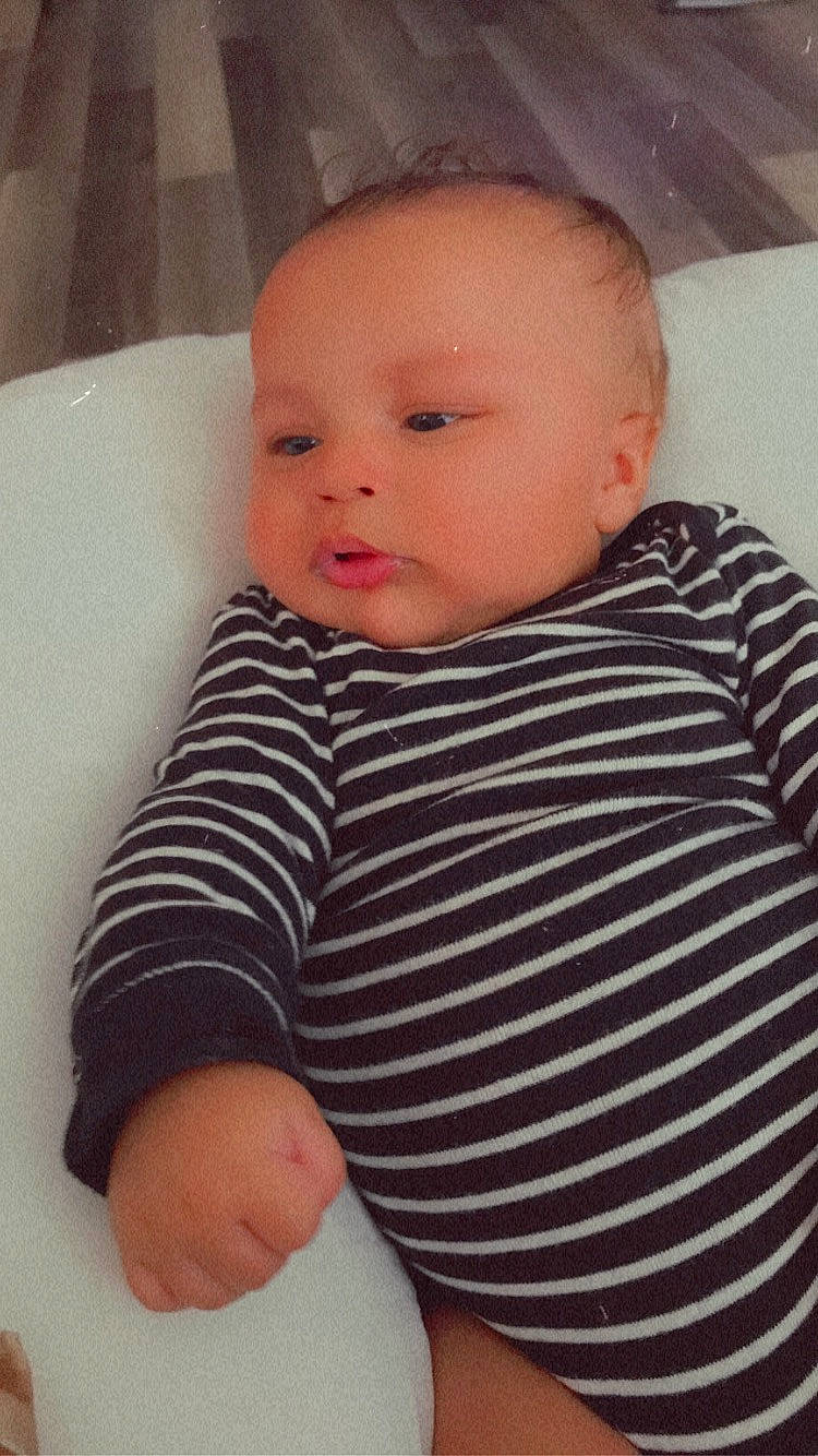 Khaza is registered to the contest to win money with this photo: baby, baby_sleeping, baby_toddler_clothing, cheek, child, chin, collar, comfort, eye, eyelash, head, iris, lip, neck, no_expression, nose, pattern, person, skin, sleeve