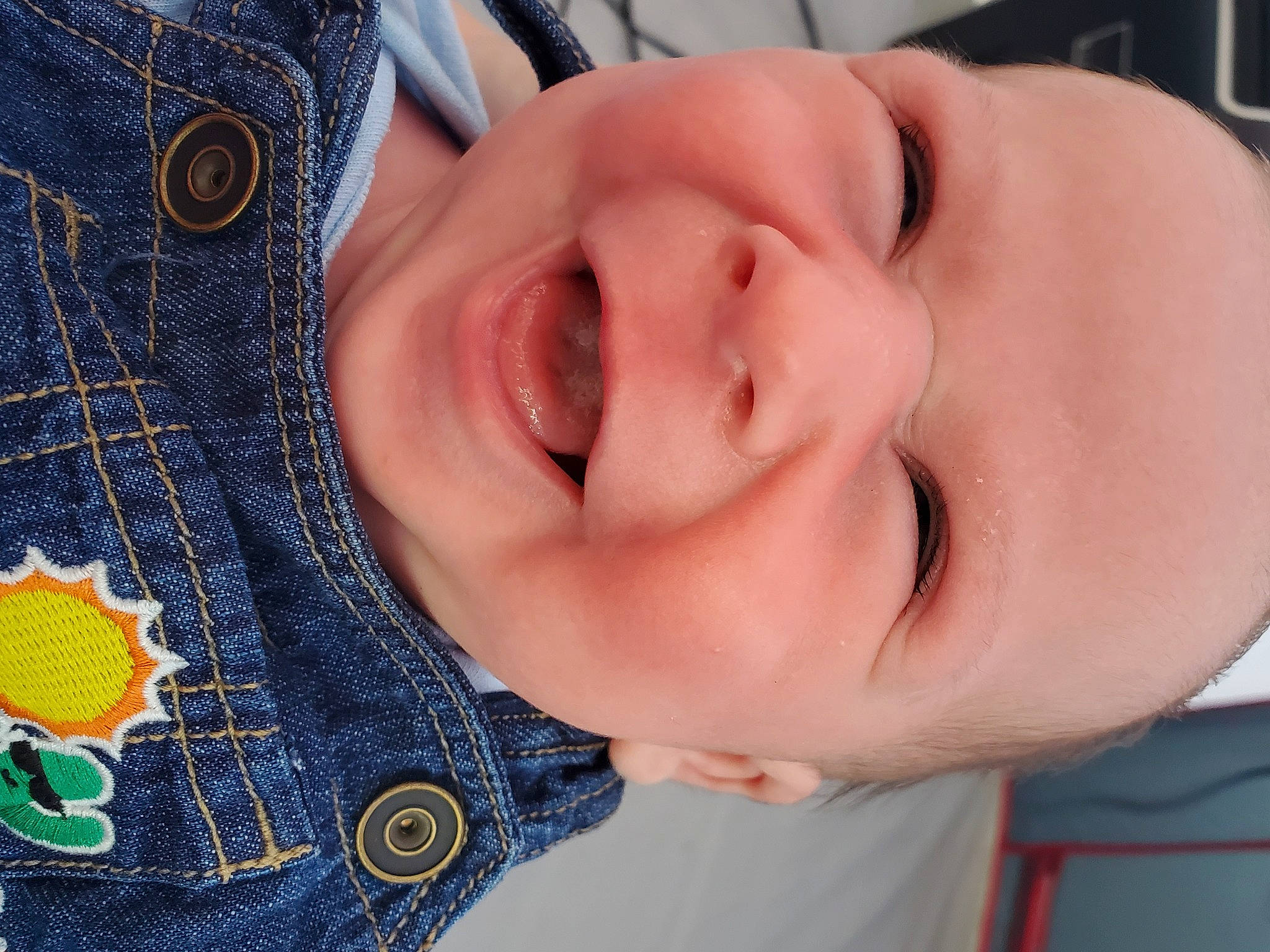 Grant is registered to the contest to win money with this photo: baby, baby_toddler_clothing, cheek, child, comfort, electric_blue, eye, eyebrow, eyelash, headgear, iris, lip, mouth, neck, nose, pattern, person, skin, sleeve, smile