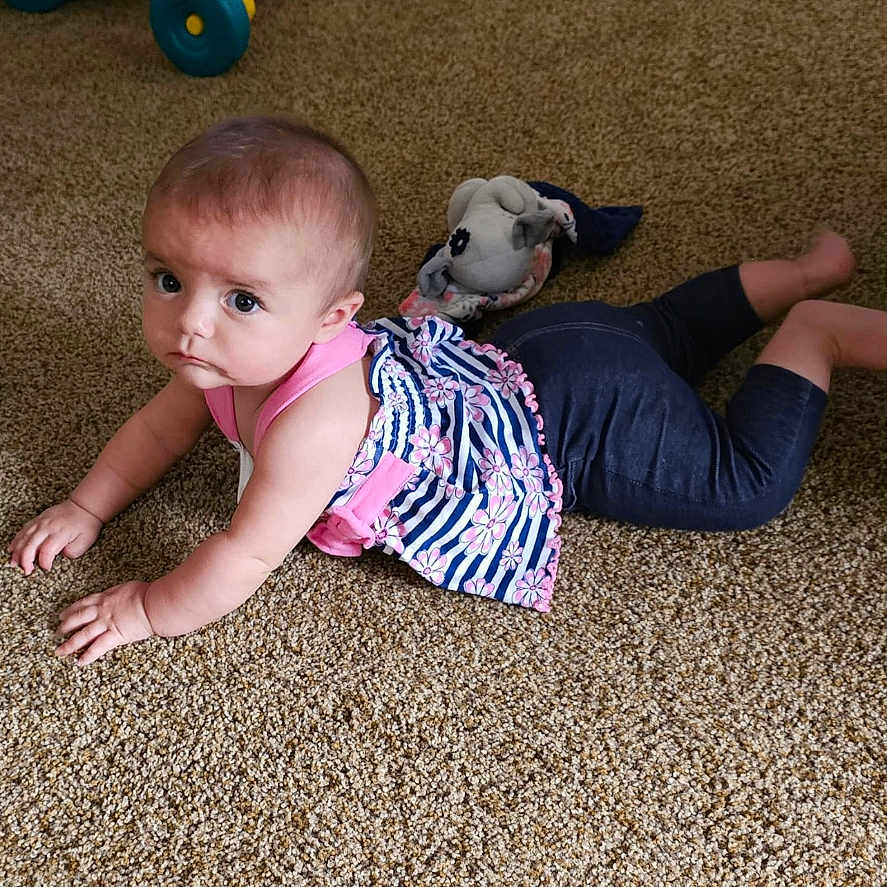 Emery is registered to the contest to win money with this photo: baby, babycrawling, bodypart, clothing, couch, crawling, face, finger, footwear, furniture, hand, head, pants, person, photography, portrait, shoe, shorts, sitting, toy