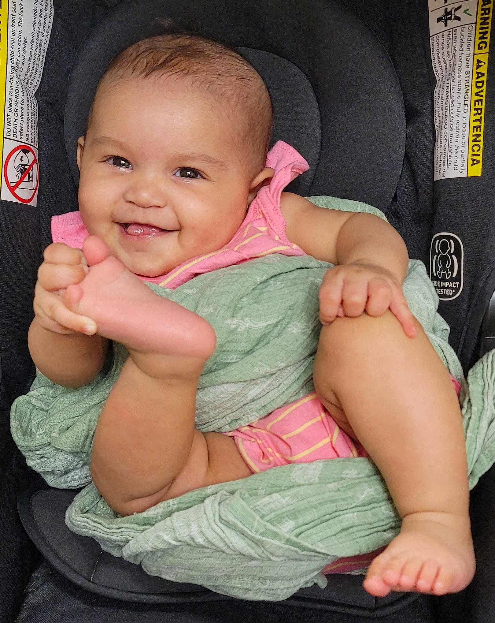 Loyalty is registered to the contest to win money with this photo: arm, baby, baby_toddler_clothing, cheek, comfort, eye, finger, gesture, hand, happy, head, human_body, iris, joy, lip, person, pink, skin, sleeve, smile