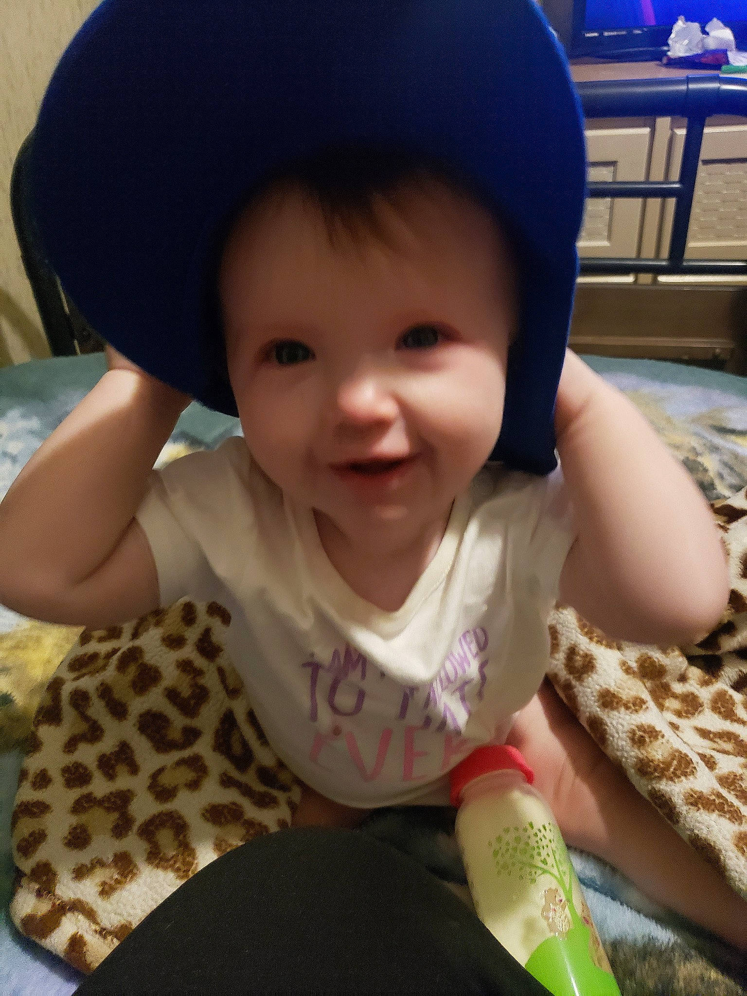 Mia Maze is registered to the contest to win money with this photo: baby, beauty, cap, cheek, child, cool, electronic_device, face, fashion_accessory, happy, hat, head, headgear, joy, person, play, skin, smile, sun_hat, toddler