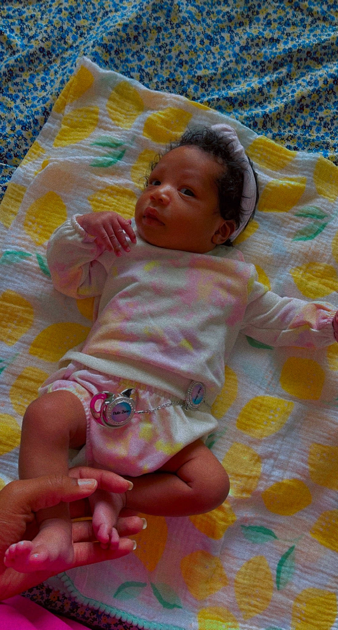 Nyla Zenn is registered to the contest to win money with this photo: baby, baby_products, baby_safety, baby_toddler_clothing, cheek, child, comfort, eye, face, finger, fun, head, iris, linens, pattern, person, pink, play, skin, summer