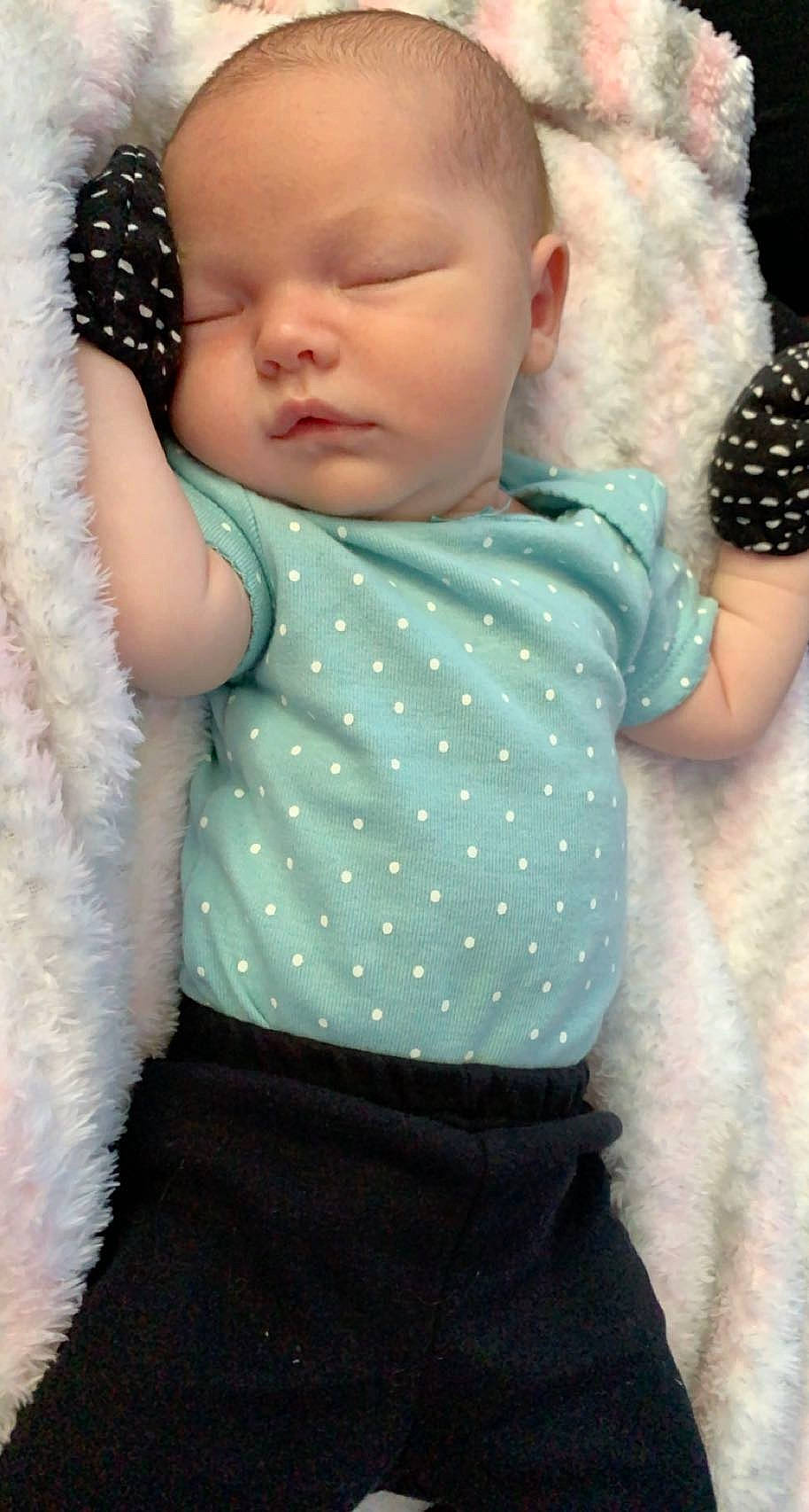 Brielle joined the competition — help win amazing prizes! arm, baby, baby_toddler_clothing, chin, face, facial_expression, green, hairstyle, hand, iris, joint, lip, neck, person, photograph, pink, shoulder, skin, sleeve, textile