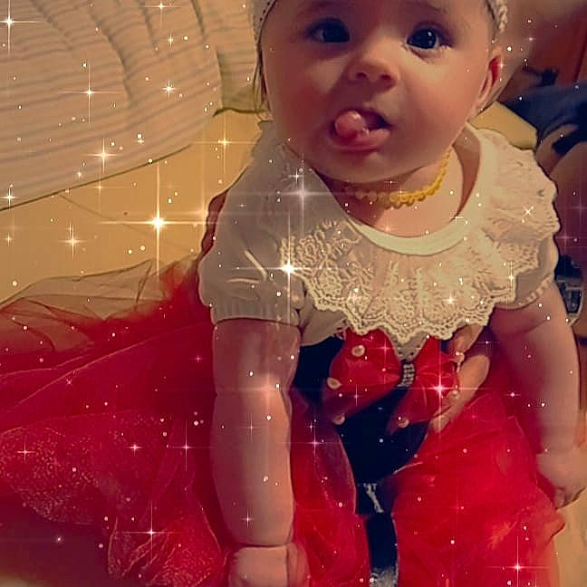 Kiara participe au concours pour gagner de l'argent avec cette photo : baby, baby_toddler_clothing, beauty, chest, cool, dress, embellishment, facial_expression, fashion_design, hairstyle, happy, headwear, human, lip, magenta, organ, person, pink, shoulder, sleeve