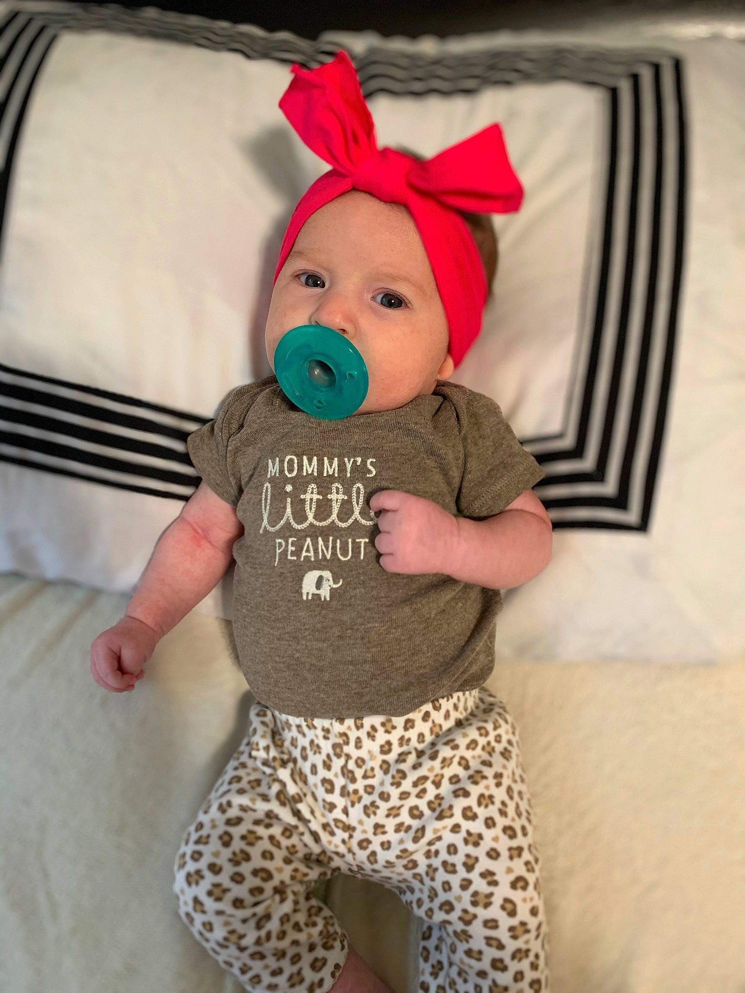 Ainsley joined the competition — help win amazing prizes! baby, baby_products, baby_toddler_clothing, child, comfort, costume, costume_hat, couch, fawn, headgear, headwear, linens, person, pink, plush, sleeve, stuffed_toy, t_shirt, textile, thigh
