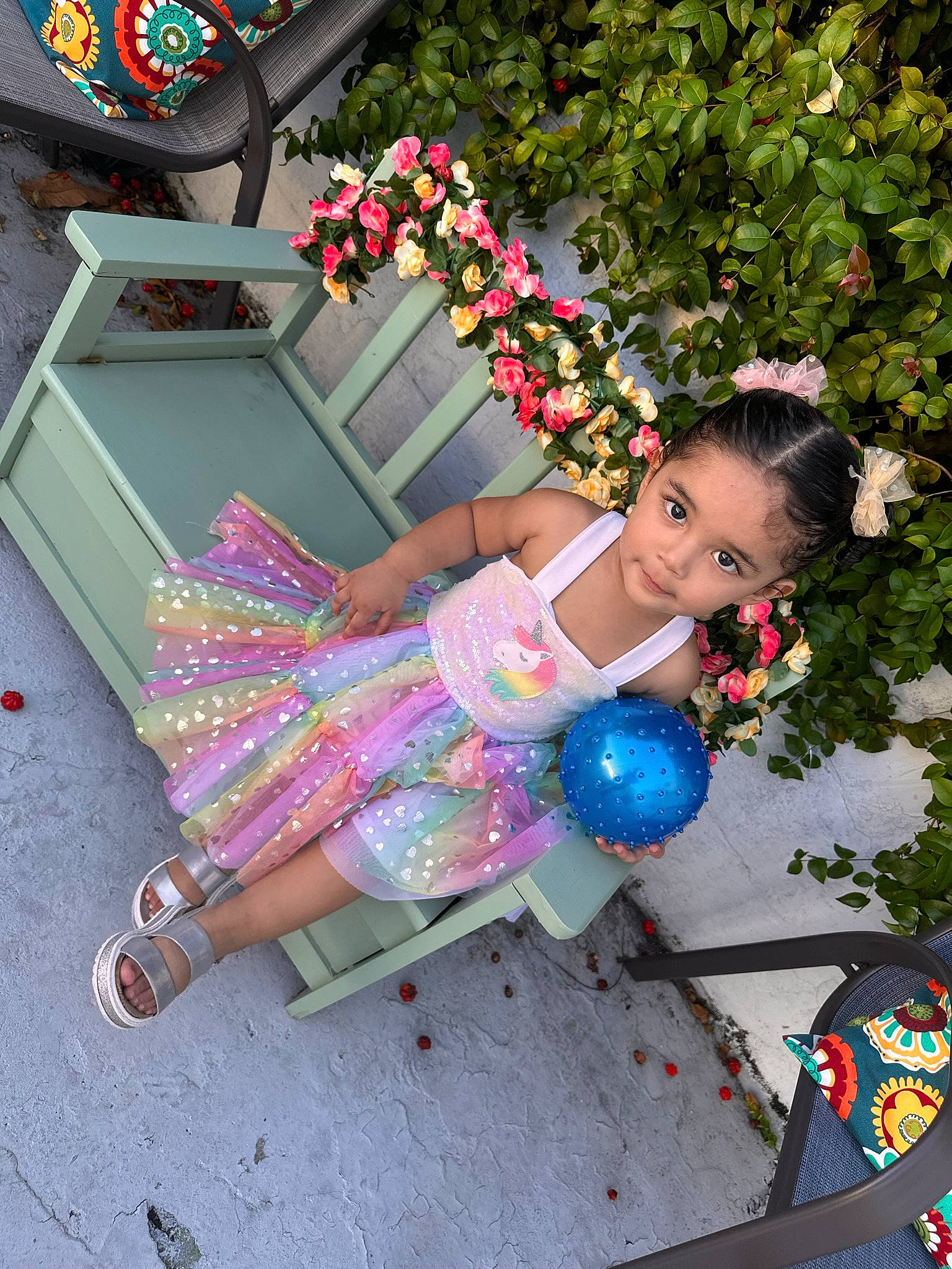 Amira joined the competition — help win amazing prizes! child, electric_blue, fashion_accessory, flower, fun, hairstyle, happy, human_leg, leisure, magenta, pattern, person, pink, plant, sandal, sitting, summer, thigh, toddler, tree