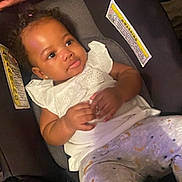 Raelynn joined the competition — help win amazing prizes! armchair, baby, babylaughing, chair, couch, cushion, face, furniture, happy, head, homedecor, person, photography, portrait, reading, sitting