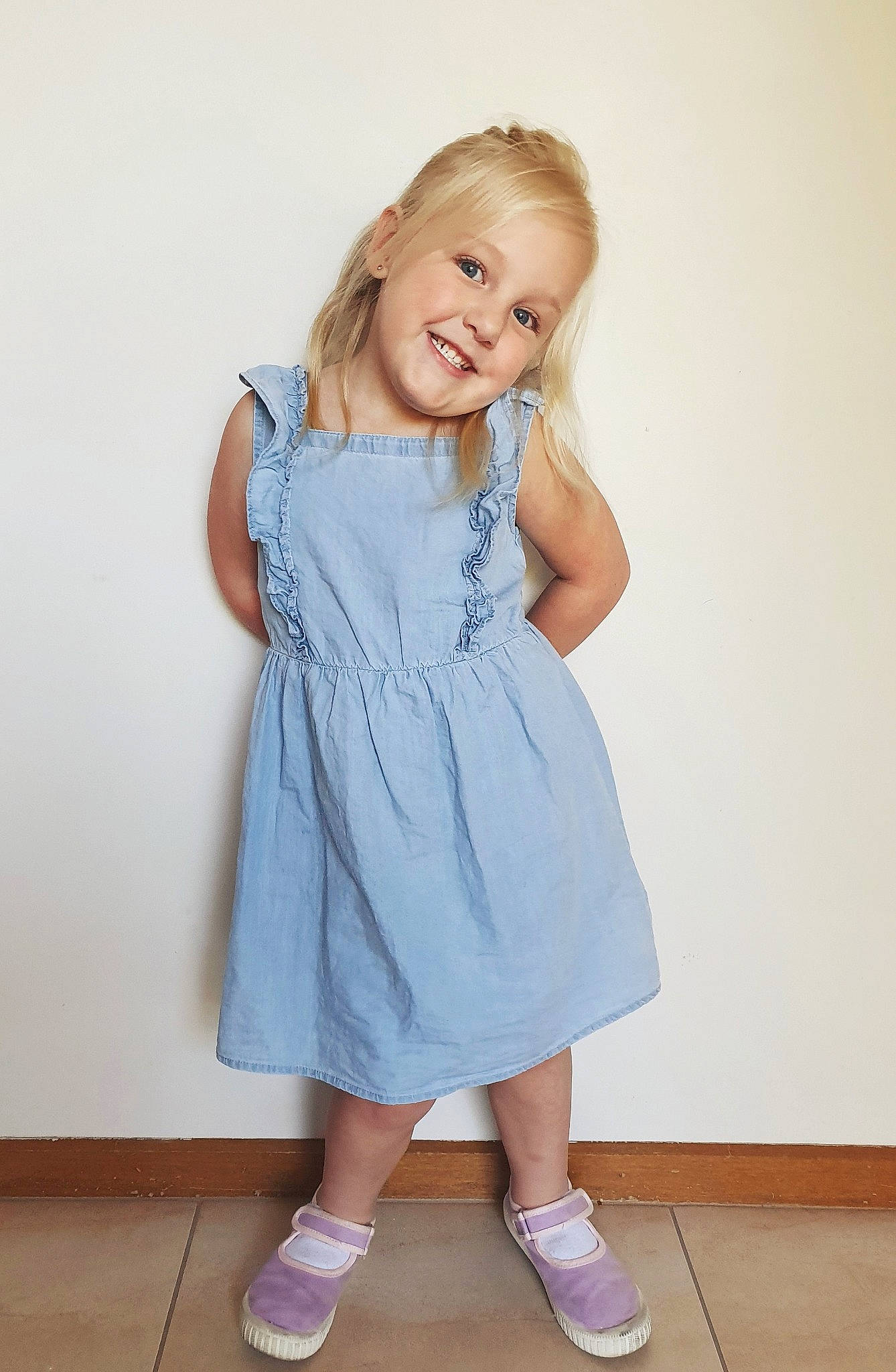 Lailah joined the competition — help win amazing prizes! blond, blue, child, child_model, clothing, denim, dress, footwear, joy, knee, one_piece_garment, pattern, person, shoe, standing, toddler