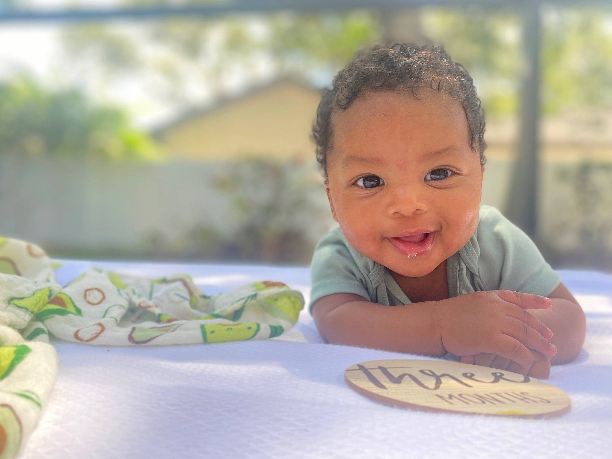 Luis is registered to the contest to win money with this photo: baby, baby_toddler_clothing, cheek, child, fun, grass, happy, laugh, leisure, people_in_nature, person, portrait_photography, recreation, sitting, skin, smile, toddler, travel, tree, vacation