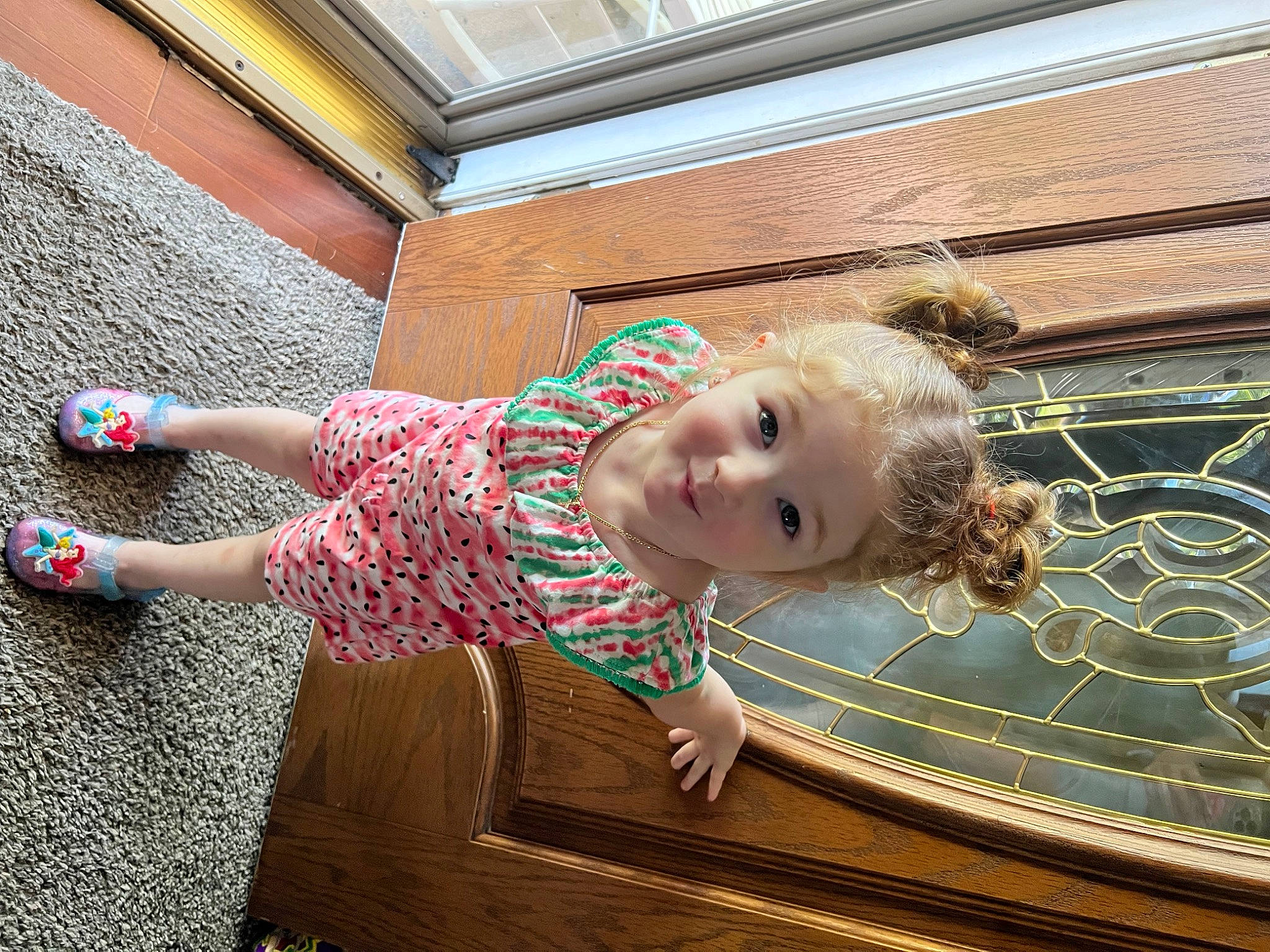 Emmersyn is registered to the contest to win money with this photo: baby, baby_toddler_clothing, child, floor, flooring, foot, fun, grass, happy, hardwood, human_leg, leisure, magenta, pattern, person, smile, toddler, vacation, window, wood
