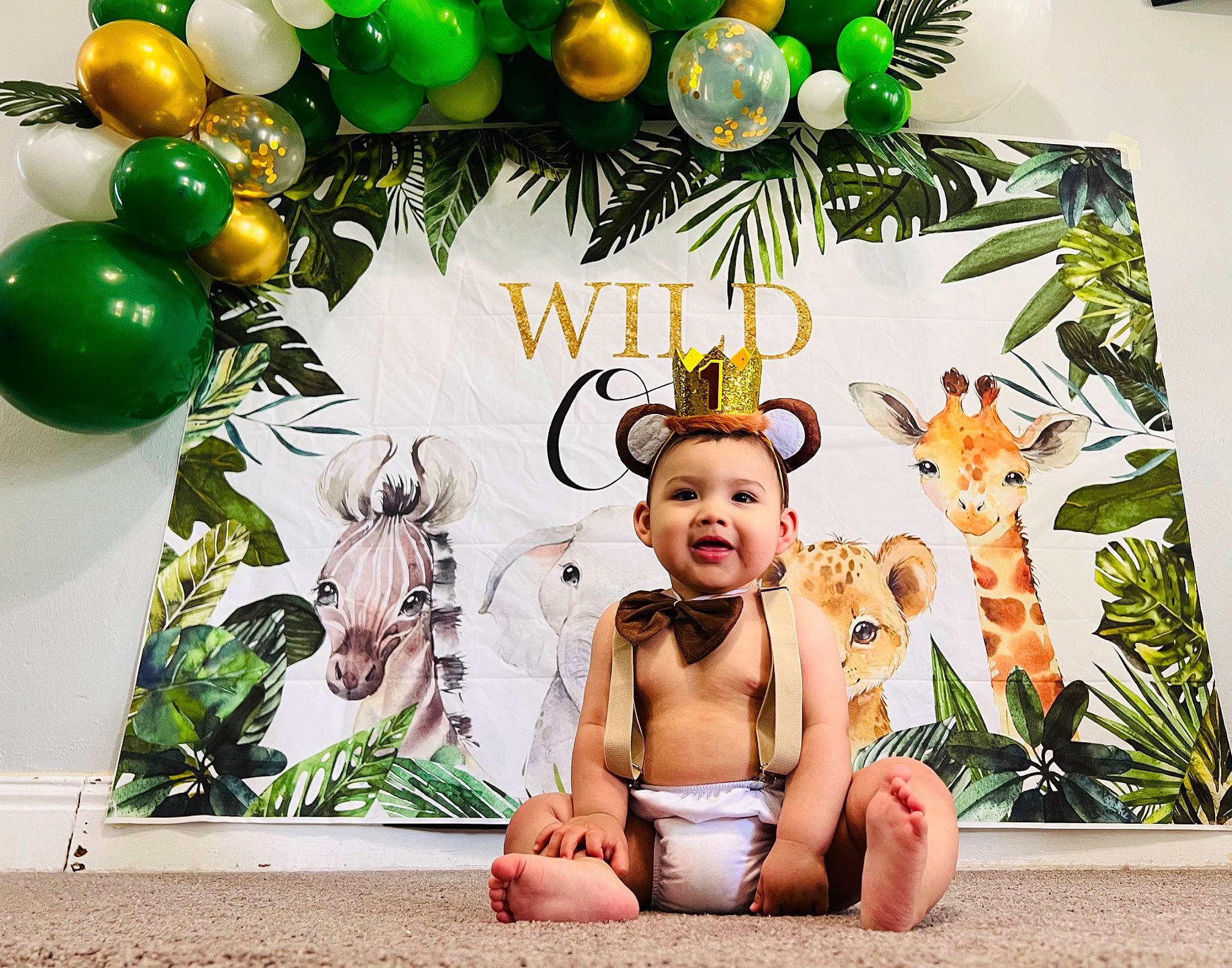 Nikolas joined the competition — help win amazing prizes! art, baby, balloon, christmas_decoration, christmas_ornament, decoration, event, floral_design, green, happy, holiday, holiday_ornament, interior_design, ornament, party_supply, person, picture_frame, plant, room, smile