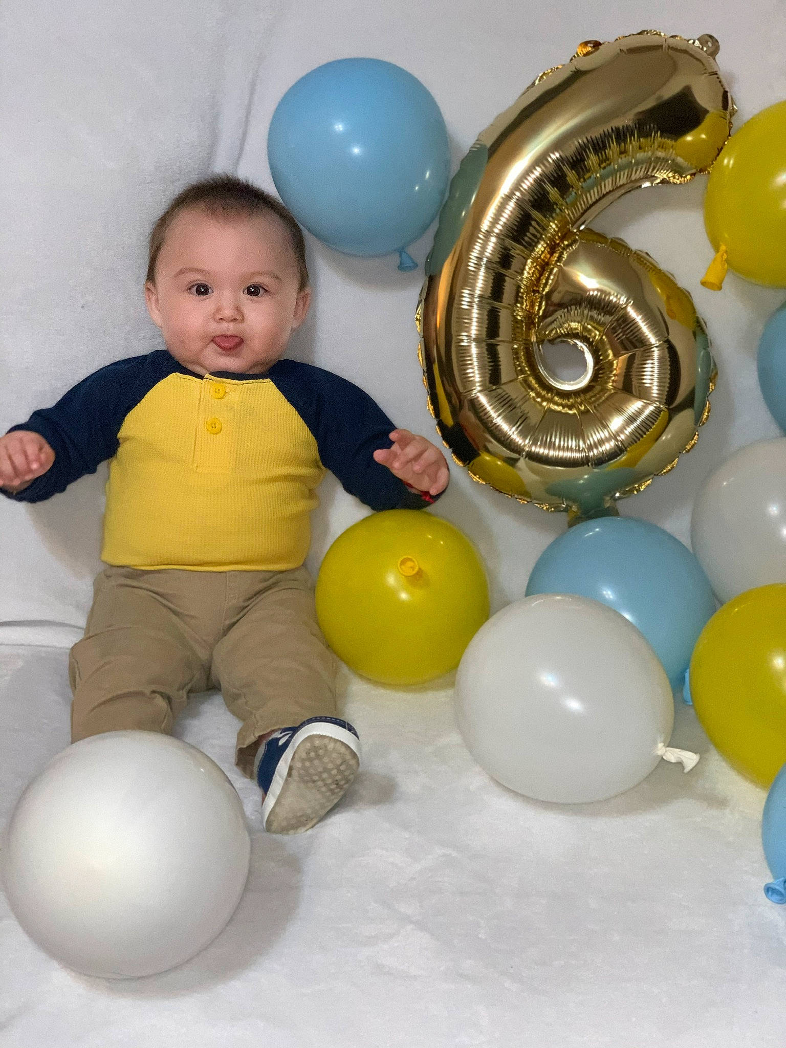Francisco joined the competition — help win amazing prizes! ball, balloon, child, fun, party_supply, person, play, smile, toddler, yellow