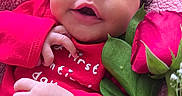 Leilani joined the competition — help win amazing prizes! baby, blanket, close_up, cozy, cute, eyes, face, flower, green_leaves, hand, happy, infant, lying_down, mouth, newborn, portrait, red_clothing, rose, skin, soft_texture