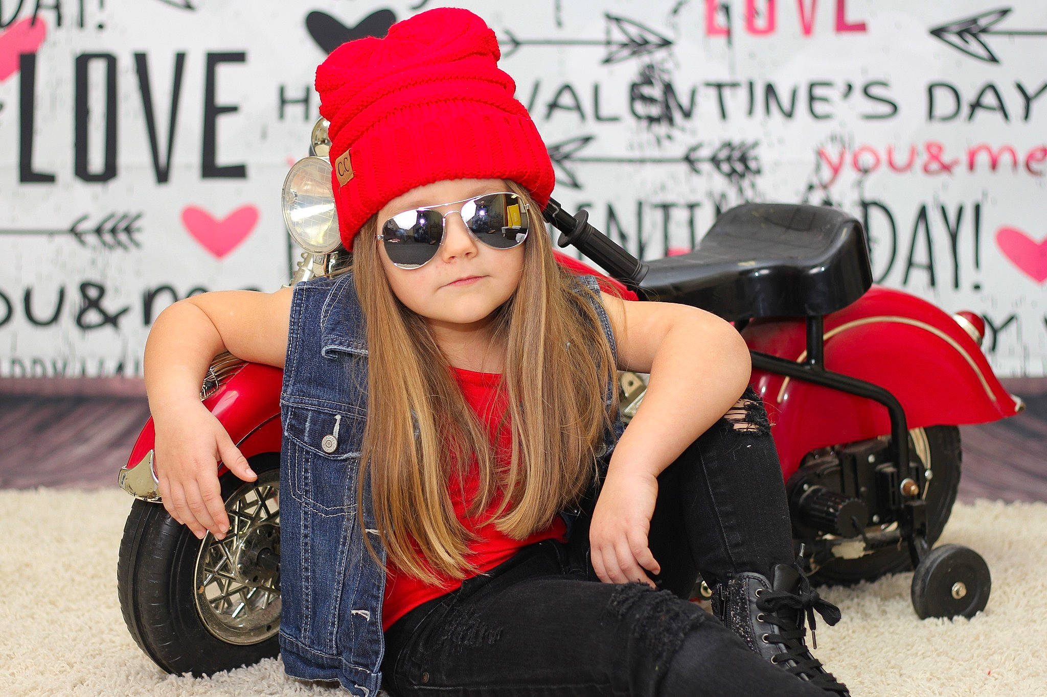 Jillian is registered to the contest to win money with this photo: beanie, black_hair, cap, cool, eyewear, fashion, fashion_accessory, footwear, glasses, headgear, headwear, leg, person, photo_shoot, photography, sitting, street_fashion, sunglasses, thigh, vehicle