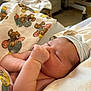Nikolai is registered to the contest to win money with this photo: newborn, baby, infant, blanket, bed, sleeping, thumb_sucking, hat, indoor, soft_light, cute, child, person, skin, peaceful, resting, comfort, closeup, toddler, nursery